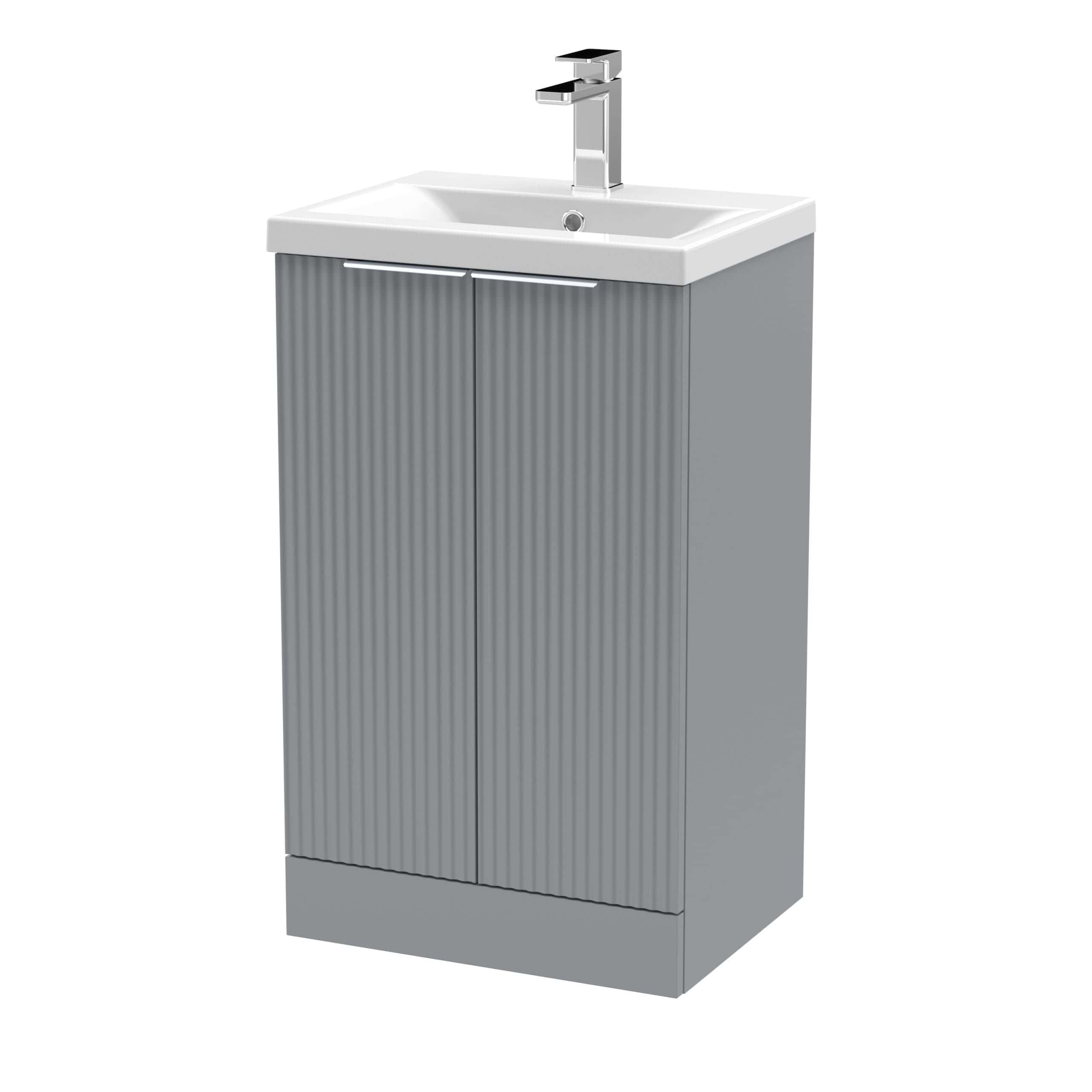 Modern grey bathroom vanity with integrated sink and sleek chrome tap, ideal for contemporary bathroom designs. Perfect for storage and functionality in stylish bathroom spaces.