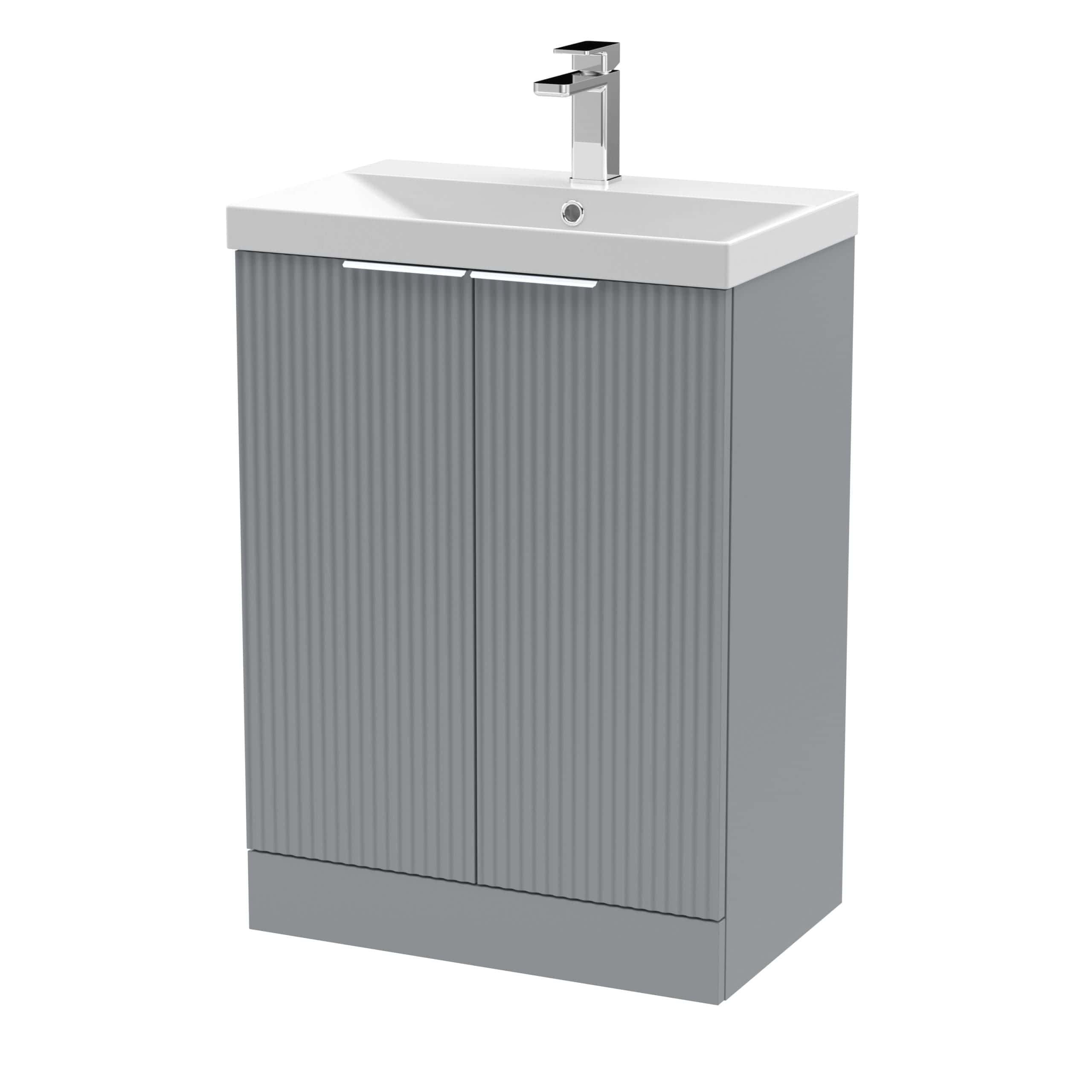 Sleek grey bathroom vanity with integrated ceramic sink and modern chrome tap, perfect for contemporary bathroom designs.