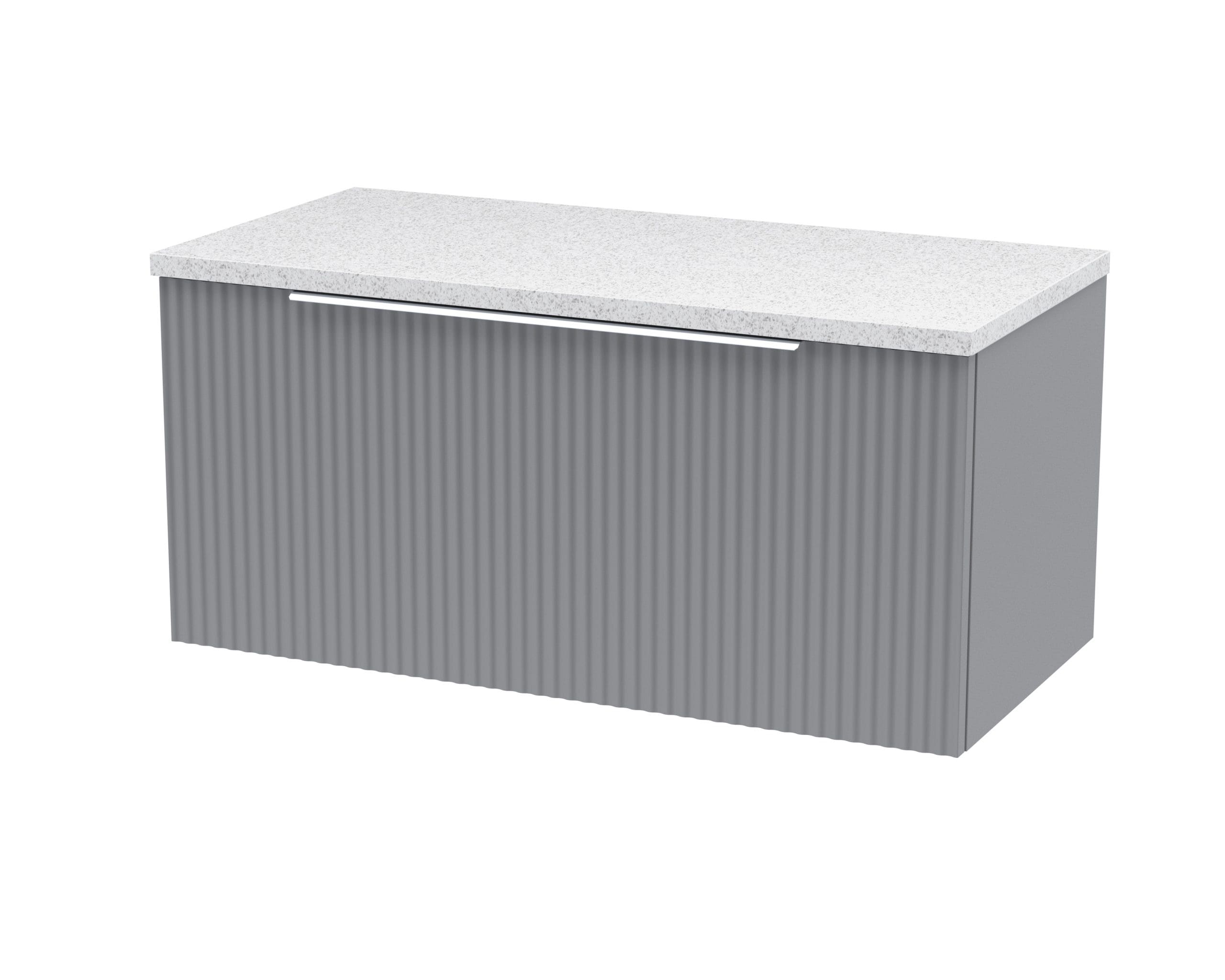 Modern grey bathroom vanity unit with textured paneling and a sleek white stone countertop, perfect for contemporary bathroom designs.