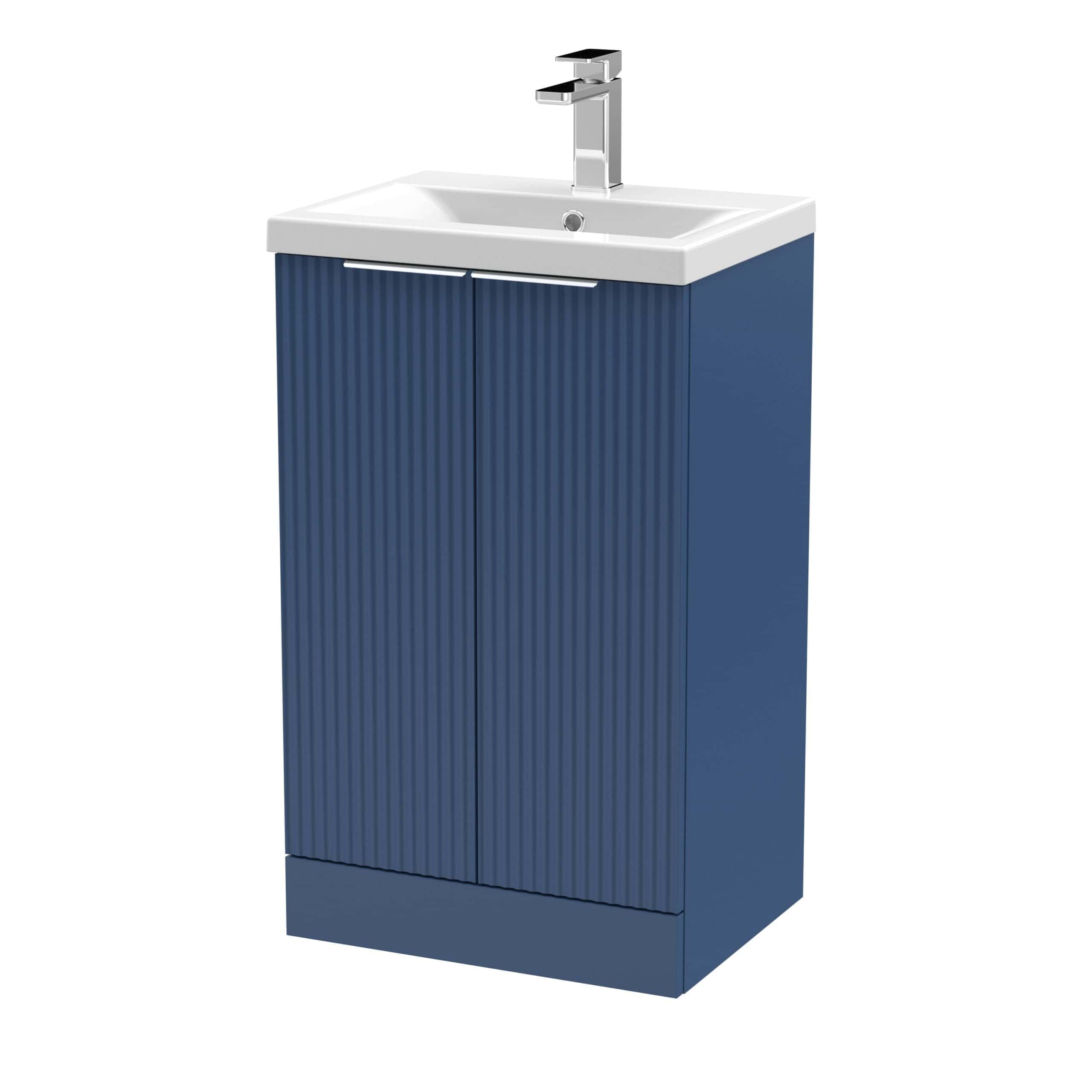 Blue bathroom vanity unit with integrated sink and chrome faucet, ideal for modern bathroom decor. Crafted for durability and sleek style, perfect for bathroom storage and functionality.