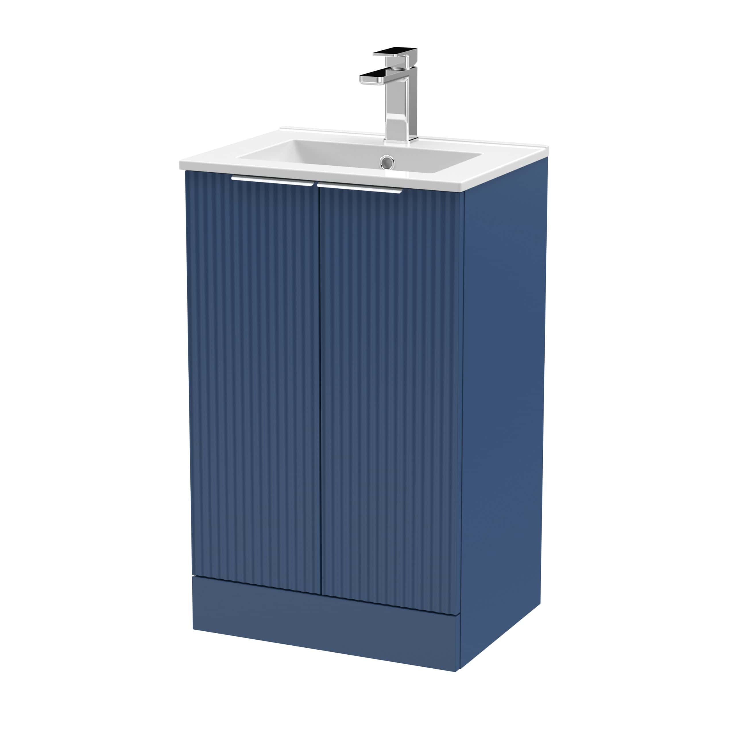 Modern blue bathroom vanity with integrated sink and sleek chrome faucet, ideal for contemporary Bubly bathrooms.
