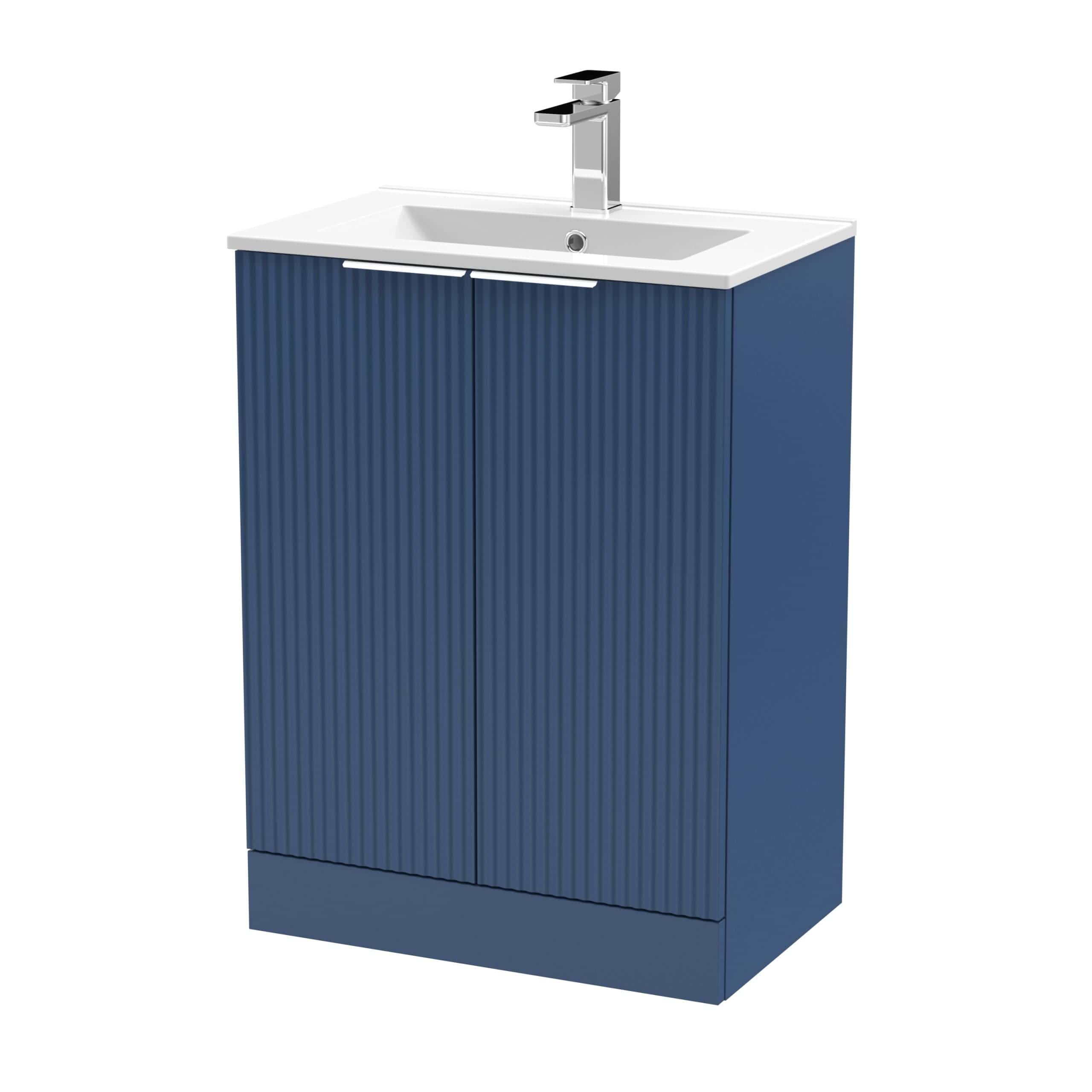 Modern blue bathroom vanity with integrated sink and sleek chrome faucet, perfect for contemporary bathroom decor. Durable finish and functional storage space ideal for small bathrooms or en-suite installations.