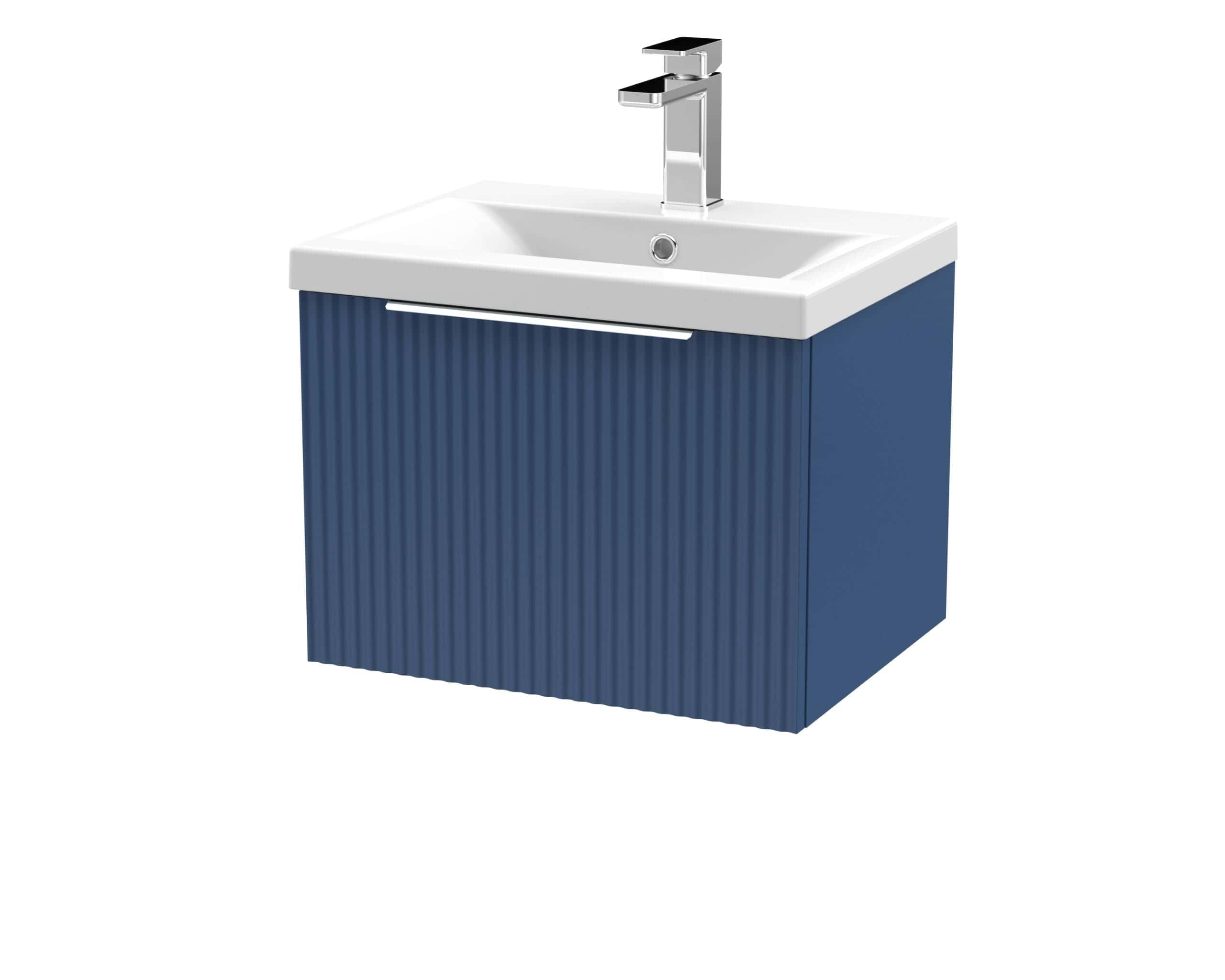 Modern bathroom vanity unit with integrated sink and stylish blue textured cabinet, perfect for enhancing your bathroom décor.