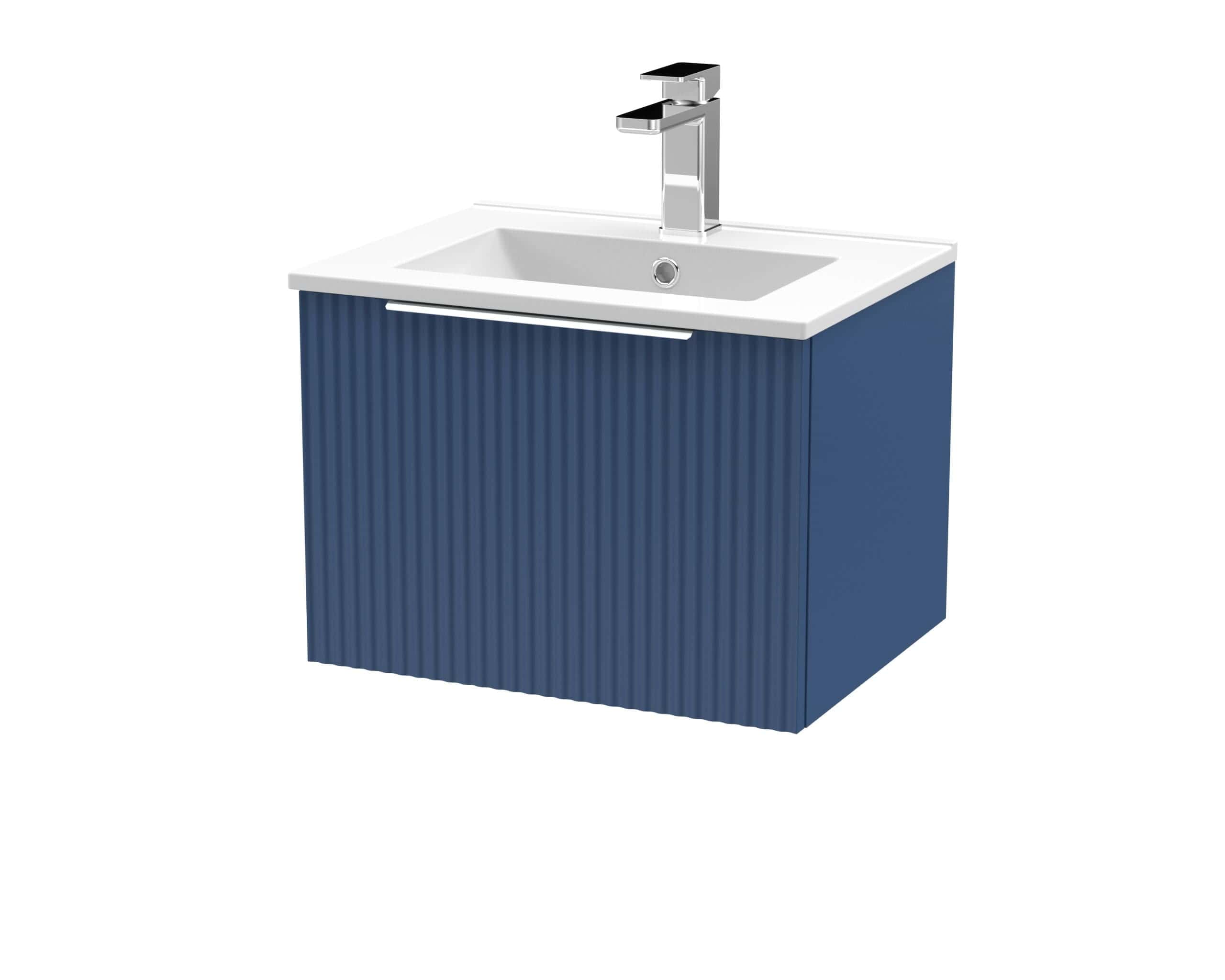 Modern bathroom vanity unit with blue ribbed cabinet and white ceramic sink, featuring a sleek chrome tap, ideal for contemporary bathroom designs.