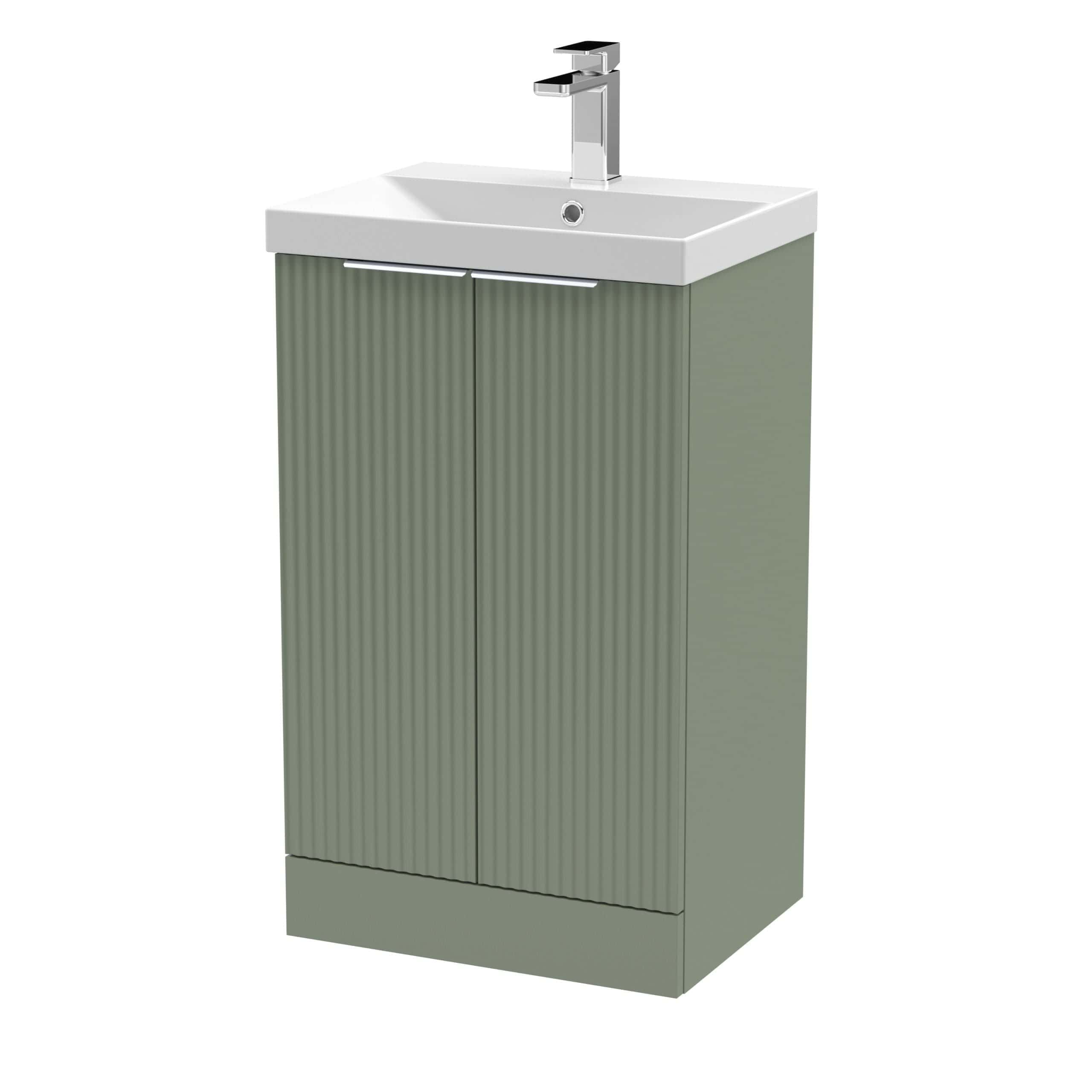Modern grey bathroom vanity unit with integrated sink and chrome tap - stylish storage solution for contemporary bathrooms. Perfect for compact spaces, combining functionality and sleek design.