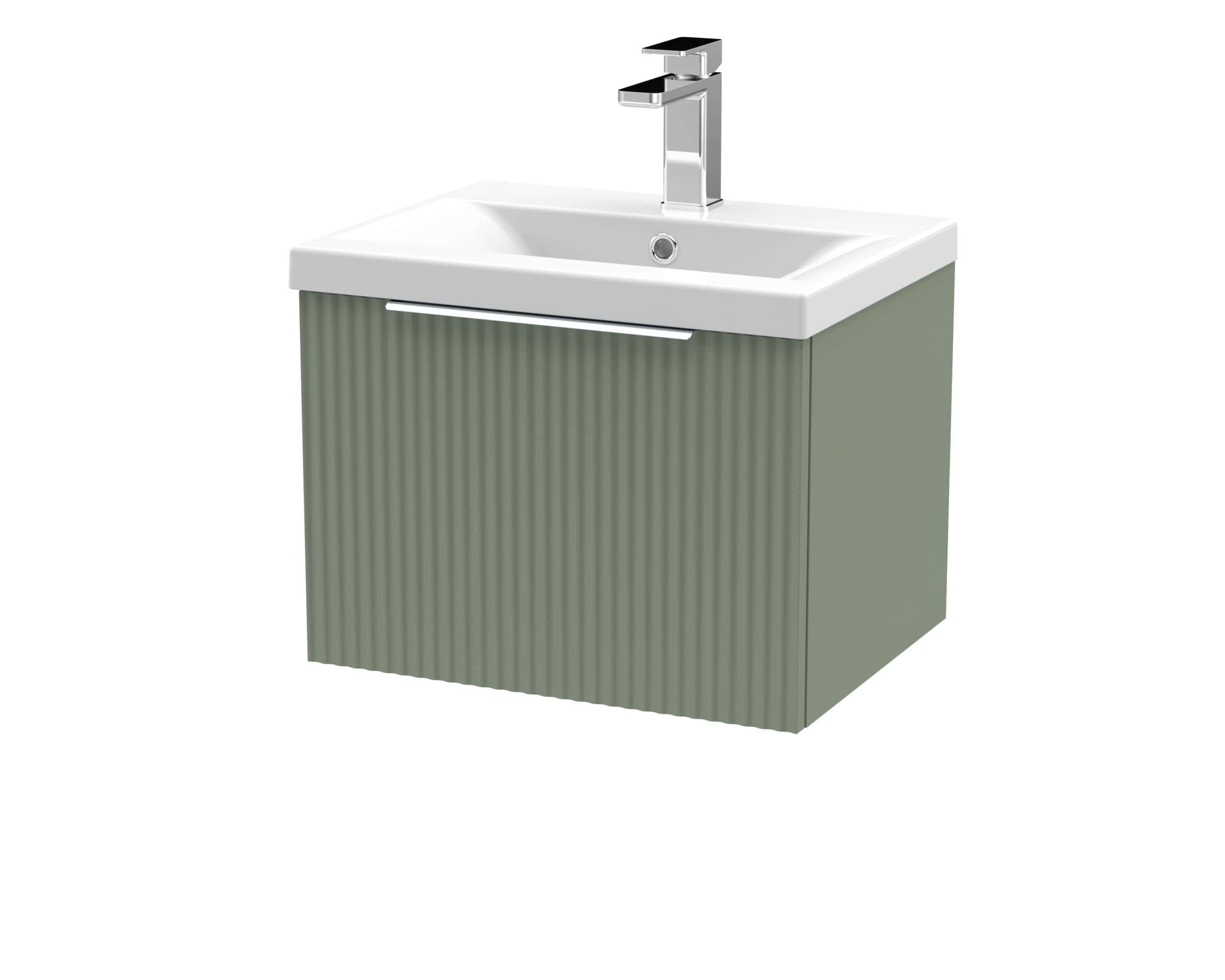 Modern green bathroom vanity with integrated sink and sleek chrome faucet, ideal for stylish bathroom interiors.