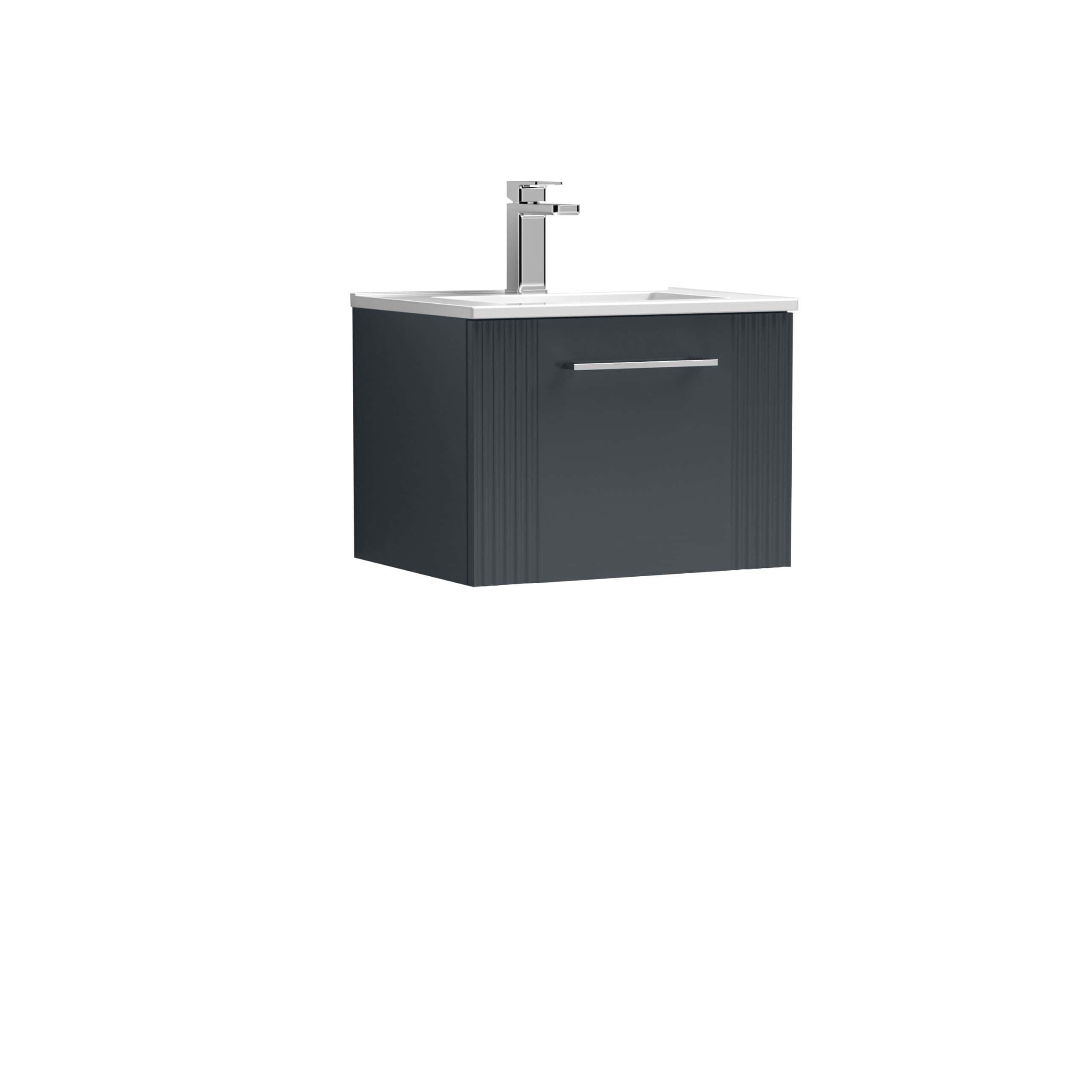 Sleek modern bathroom vanity with a dark grey finish, integrated sink, and chrome faucet, perfect for contemporary bathroom interiors.
