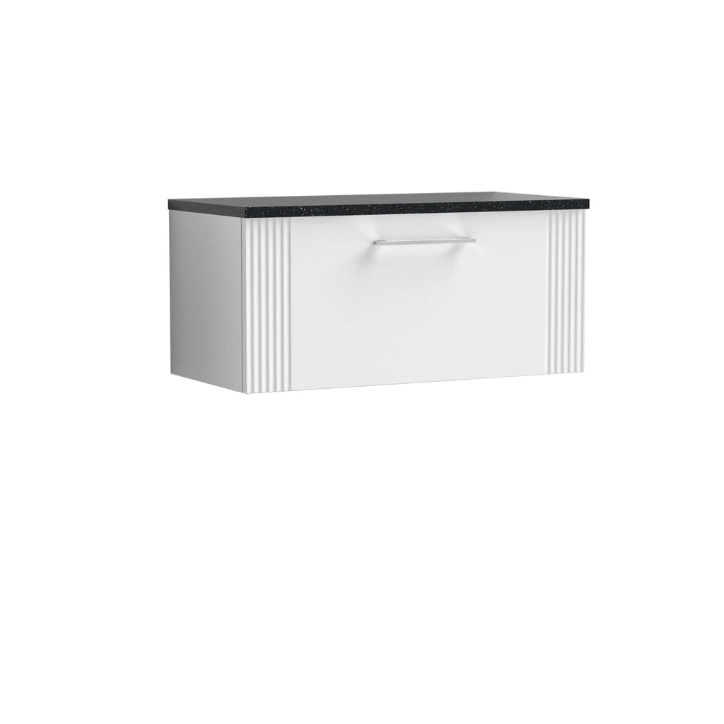 Contemporary bathroom vanity with sleek white finish, vertical grooved accents, and black quartz countertop, ideal for modern bathroom designs.