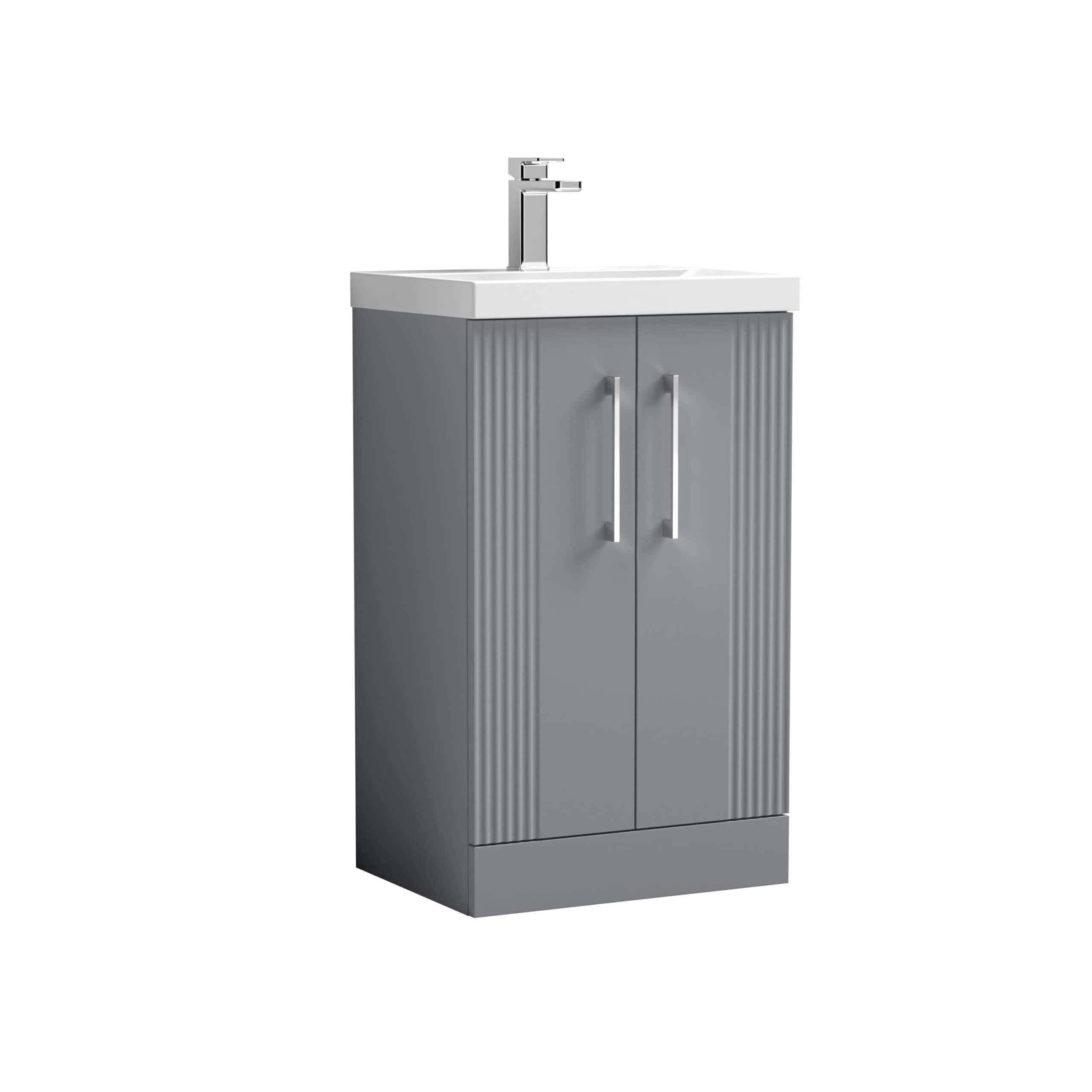 Modern grey bathroom vanity with a white ceramic sink and chrome faucet, ideal for contemporary bathroom design. Durable storage cabinet with sleek handles for toiletries and essentials.
