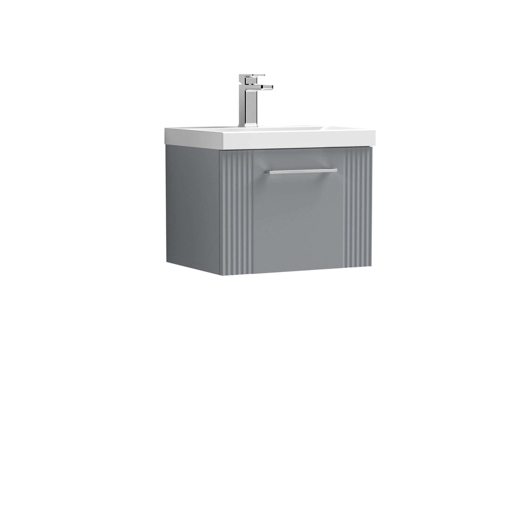 Modern grey bathroom vanity with integrated sink and sleek chrome faucet, ideal for contemporary bathroom designs. Durable cabinetry with handle storage, perfect for stylish and functional bathroom storage solutions.