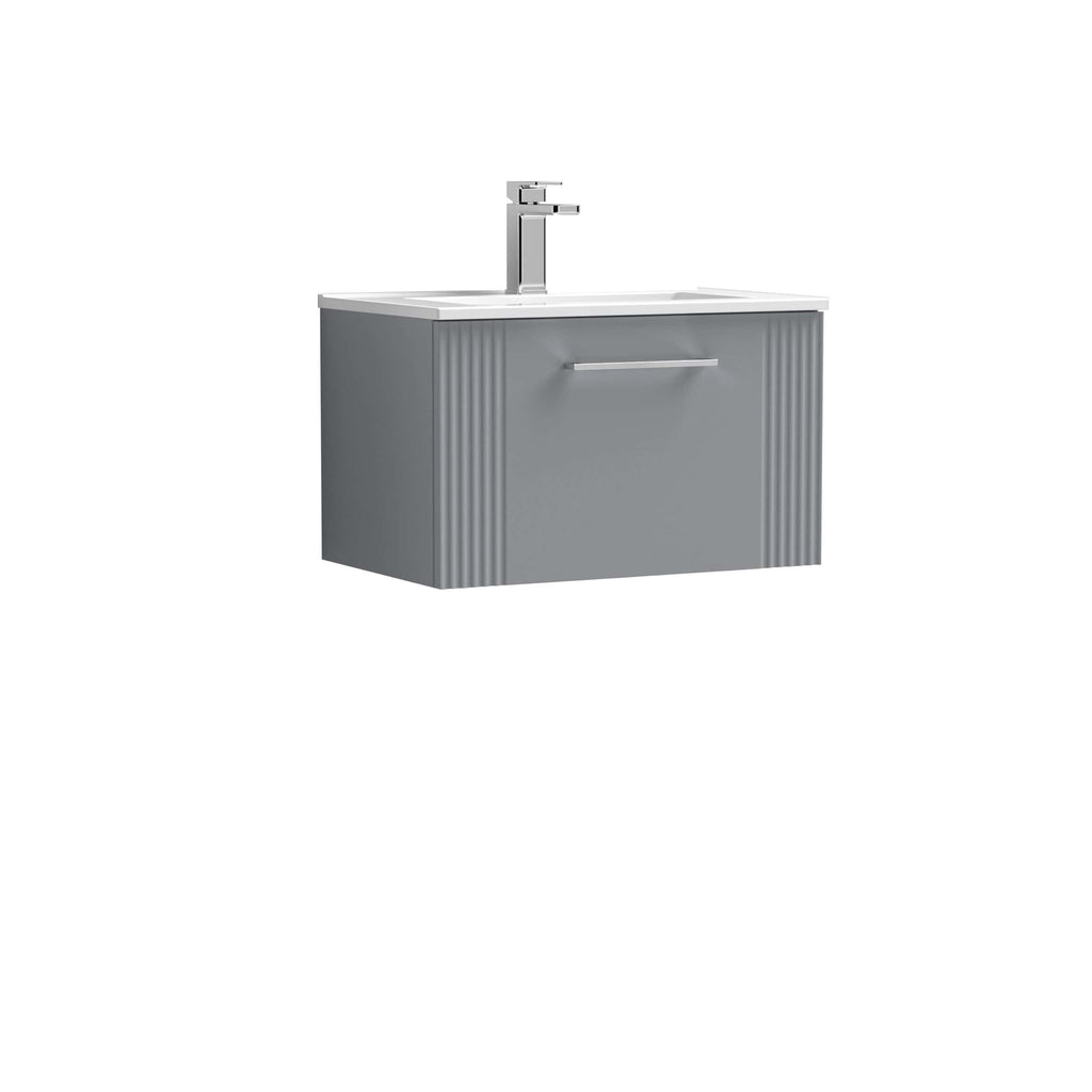 Sleek grey bathroom vanity with integrated sink and modern chrome tap, ideal for contemporary bathroom decor.