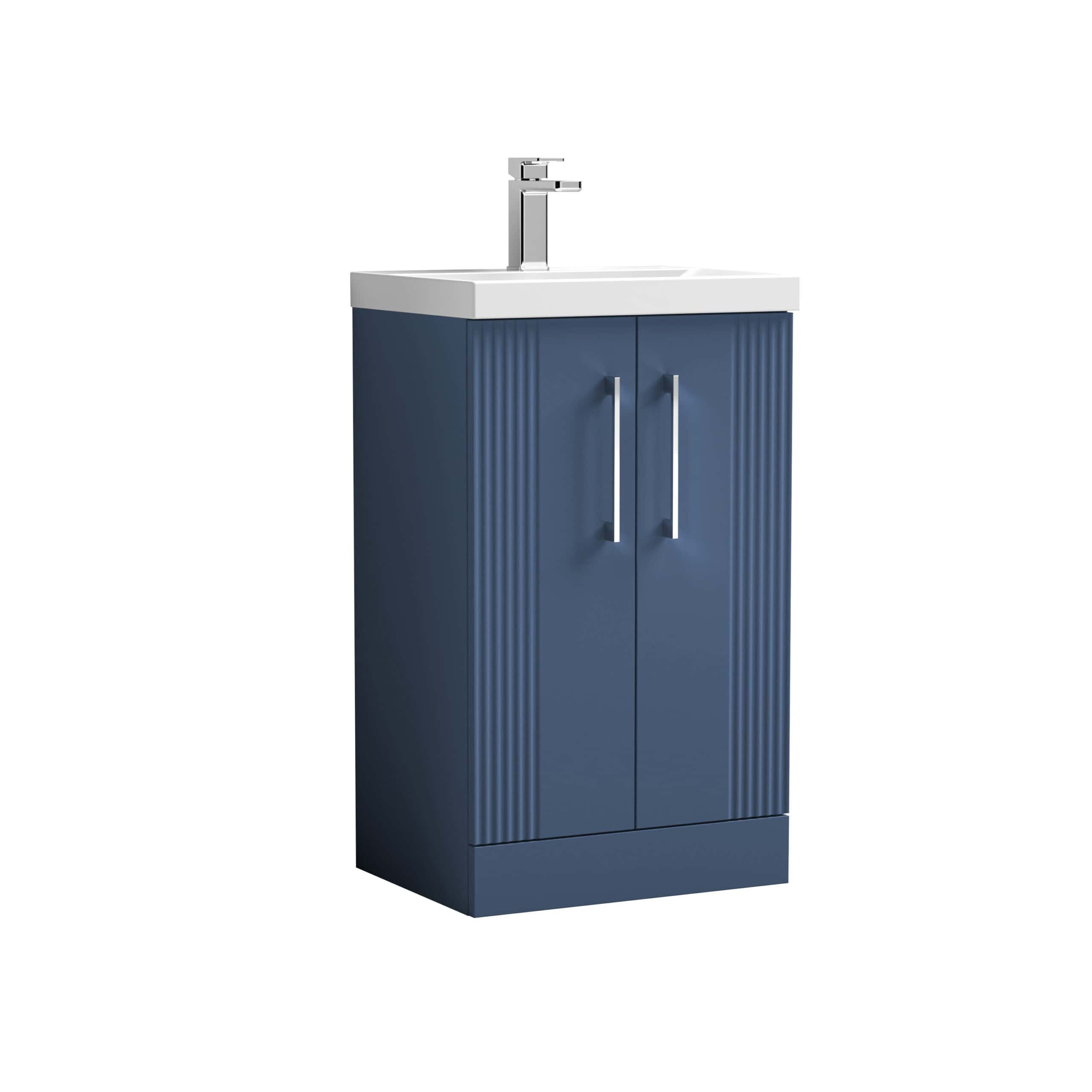 Blue bathroom vanity with inset sink and chrome tap, features ribbed door panels and modern handles, ideal for contemporary bathroom interior design.