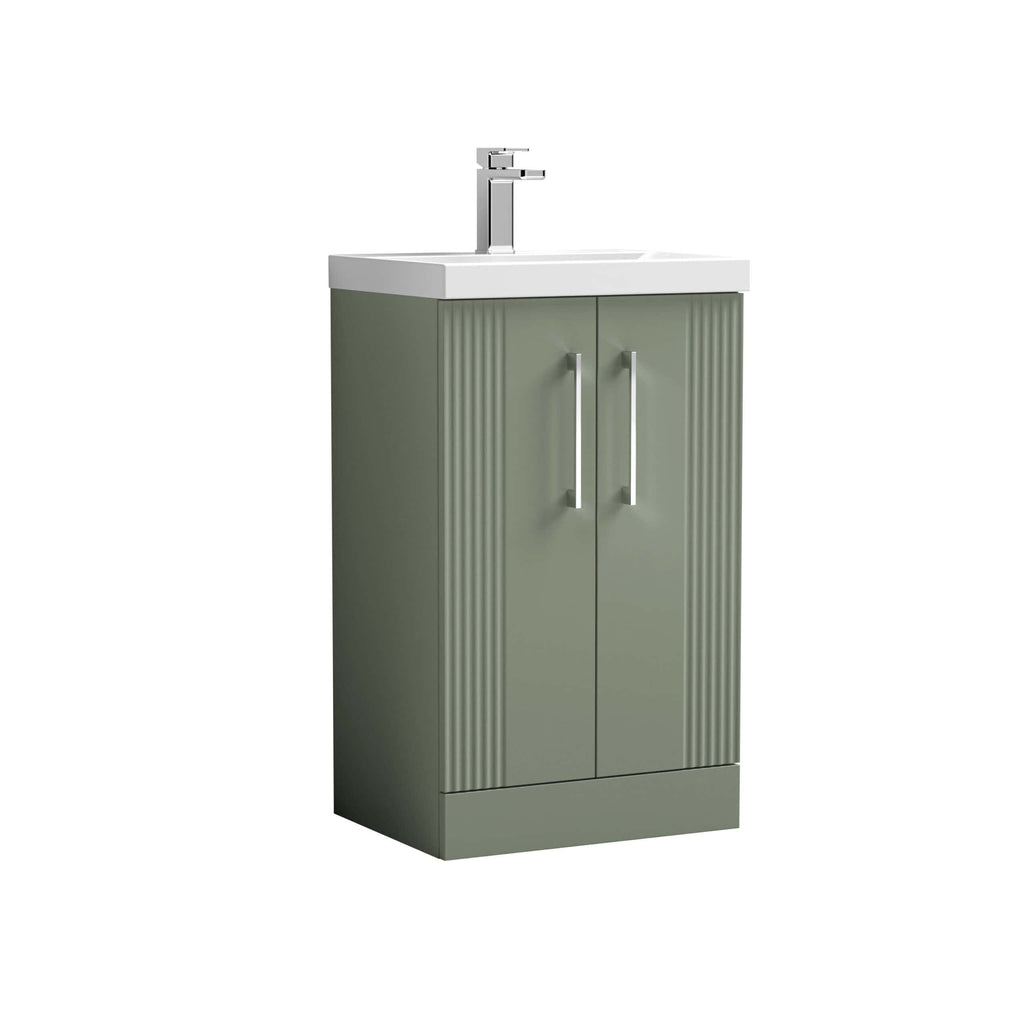 Modern green bathroom cabinet with a white sink and chrome tap, ideal for stylish bathroom vanity units. Durable furniture with vertical ribbed panel design, perfect for contemporary bathroom interiors.