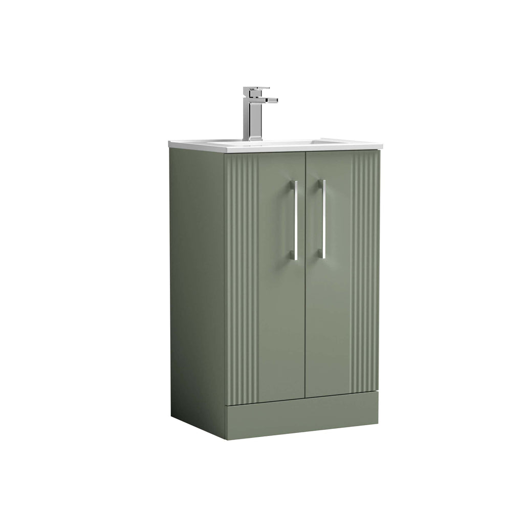 Modern green bathroom vanity with a sleek white countertop and chrome faucet, ideal for contemporary bathroom decor.
