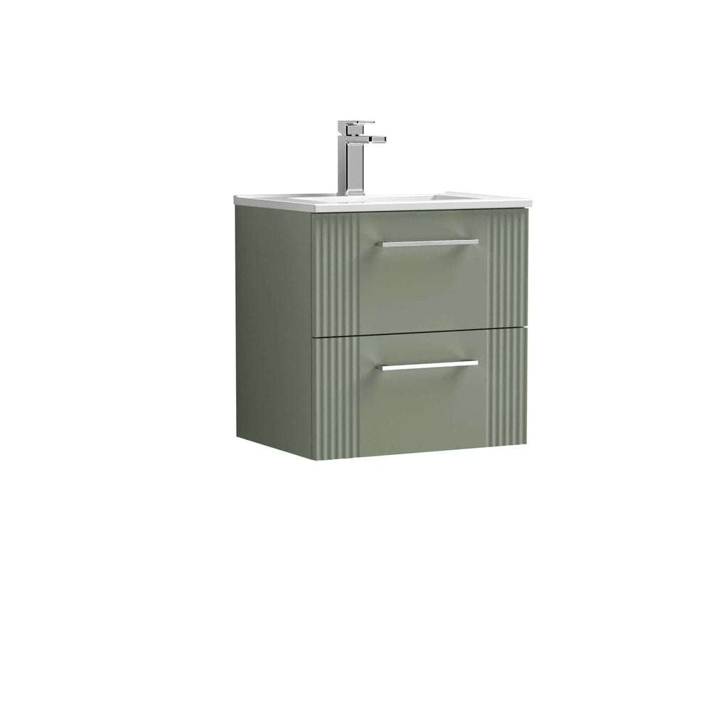 Sleek green bathroom vanity with integrated sink and chrome handles, ideal for modern bathroom interior design and storage solutions.