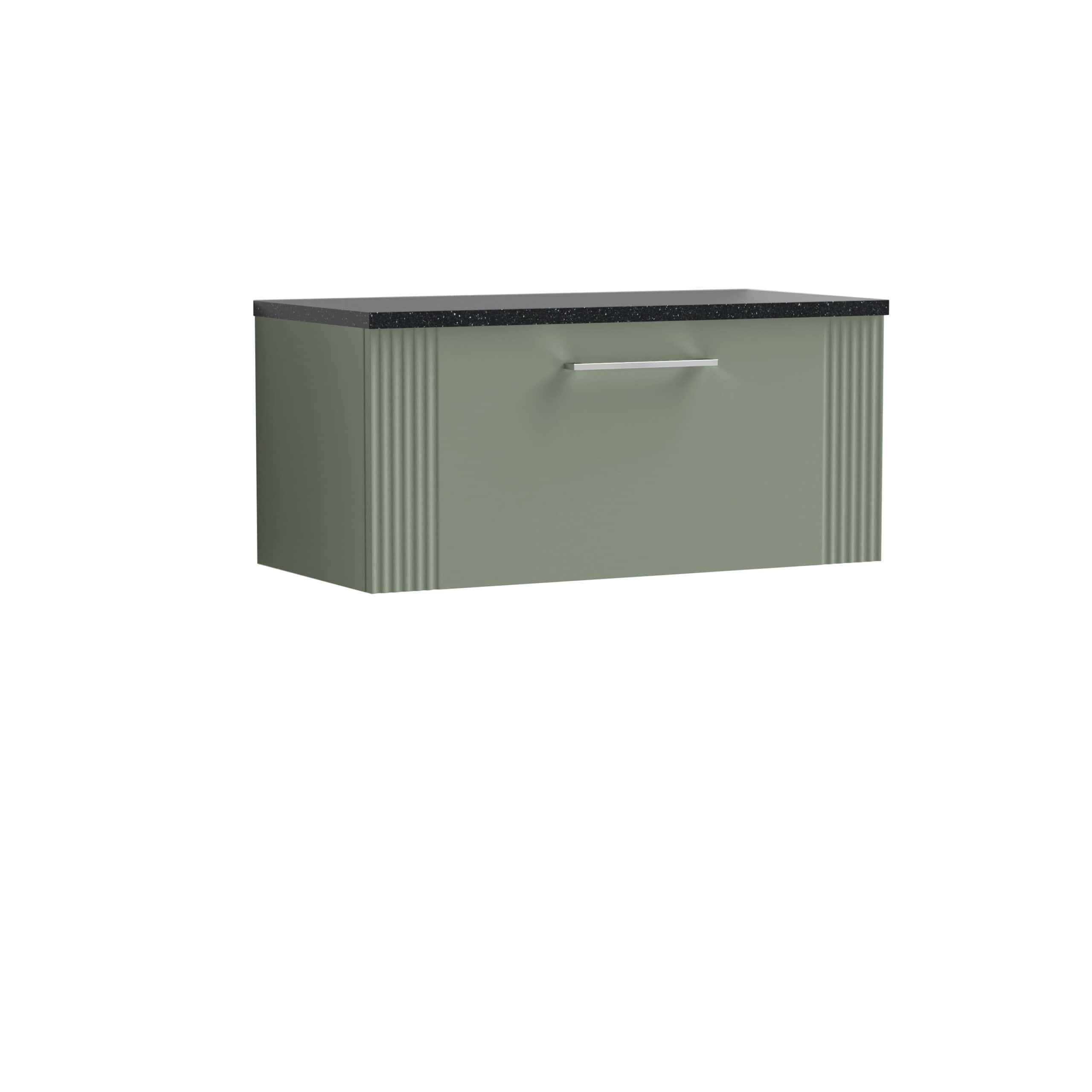 Stylish mint green bathroom vanity with a sleek black speckled countertop and modern silver handle, ideal for contemporary bathroom decor.
