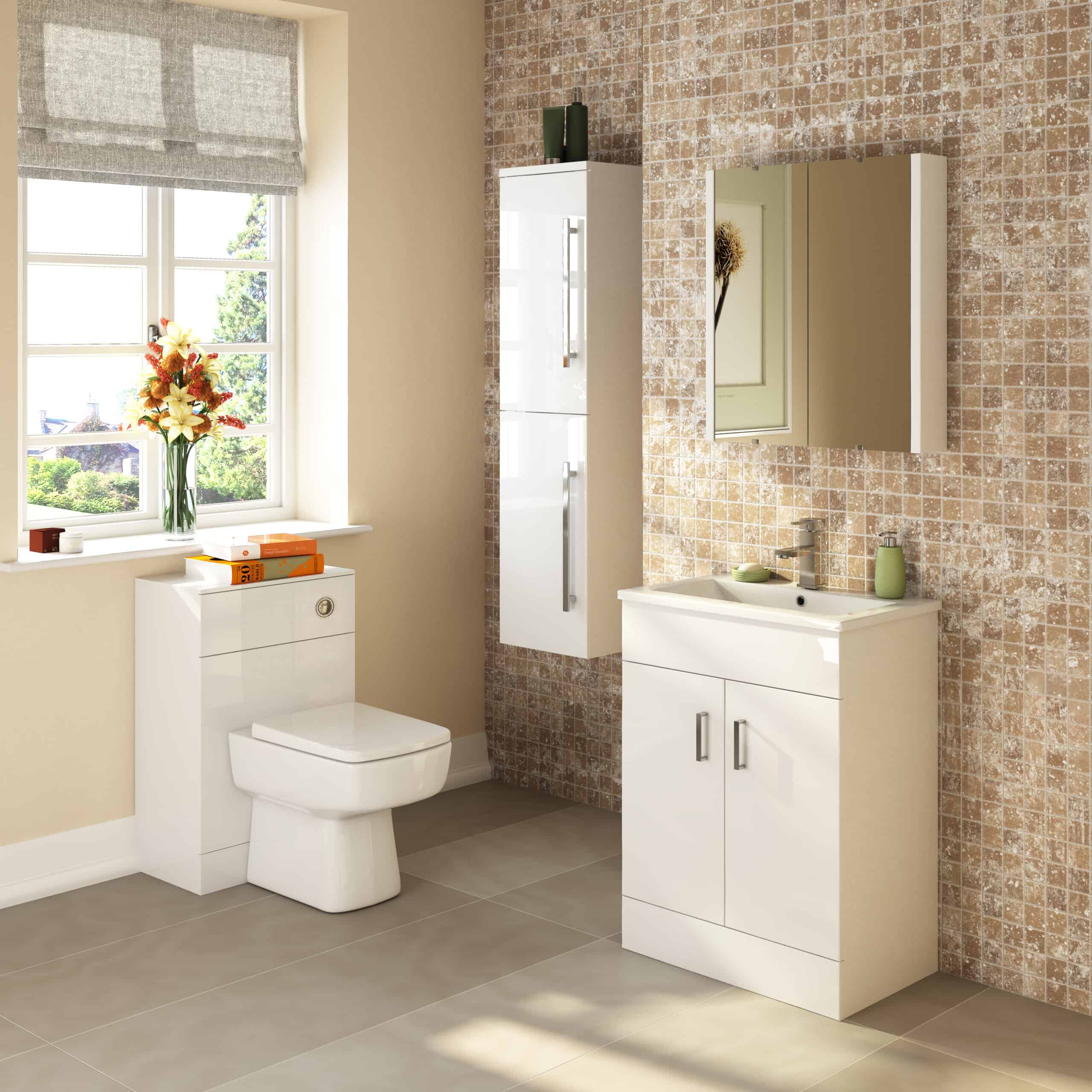 Modern white bathroom vanity with sink and mirrored cabinet, beige tiled wall, and natural light from a window, creating a bright and stylish bathroom space.