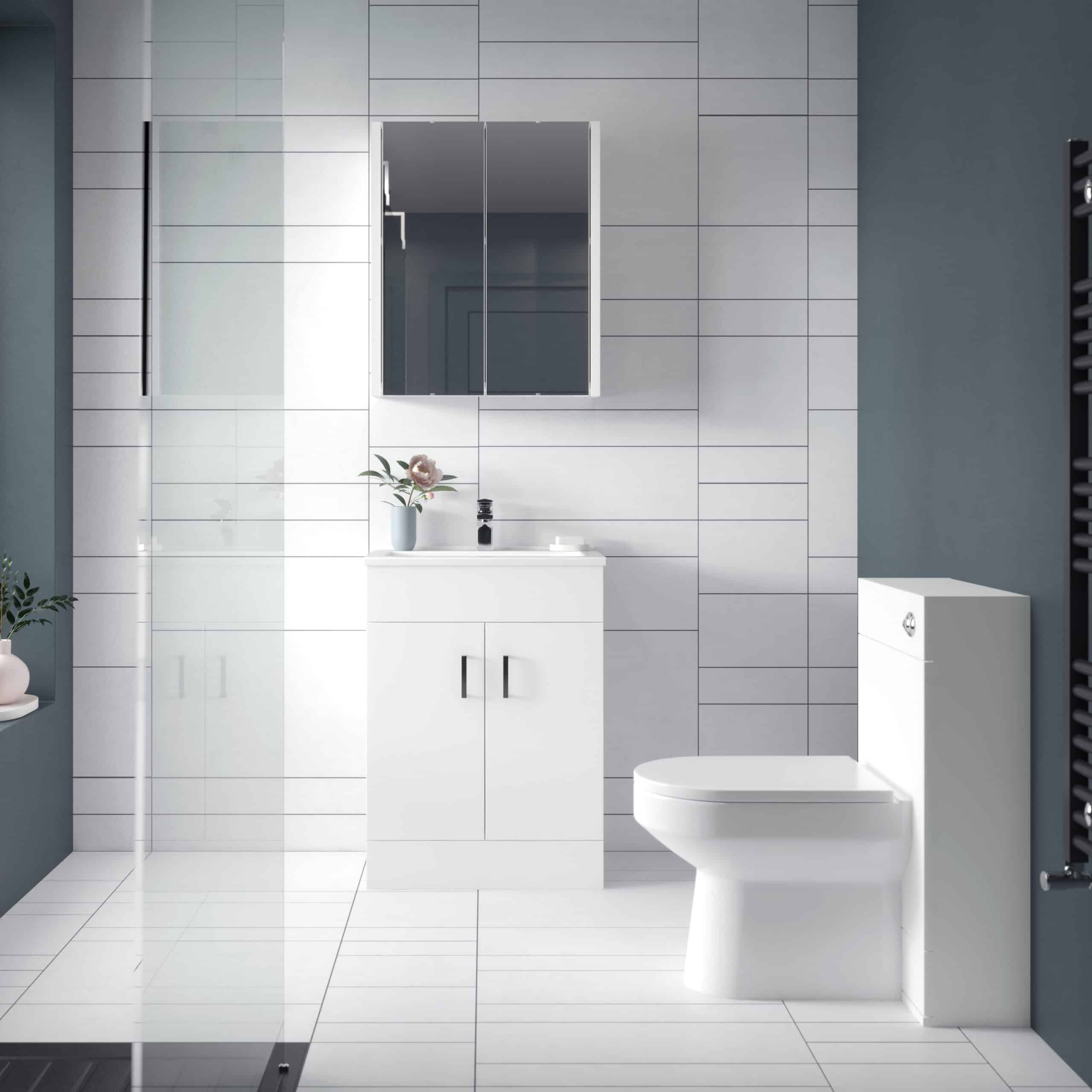 Modern minimalistic bathroom with white fixtures, sleek vanity unit, and contemporary mirror - ideal for stylish bedroom bathrooms.