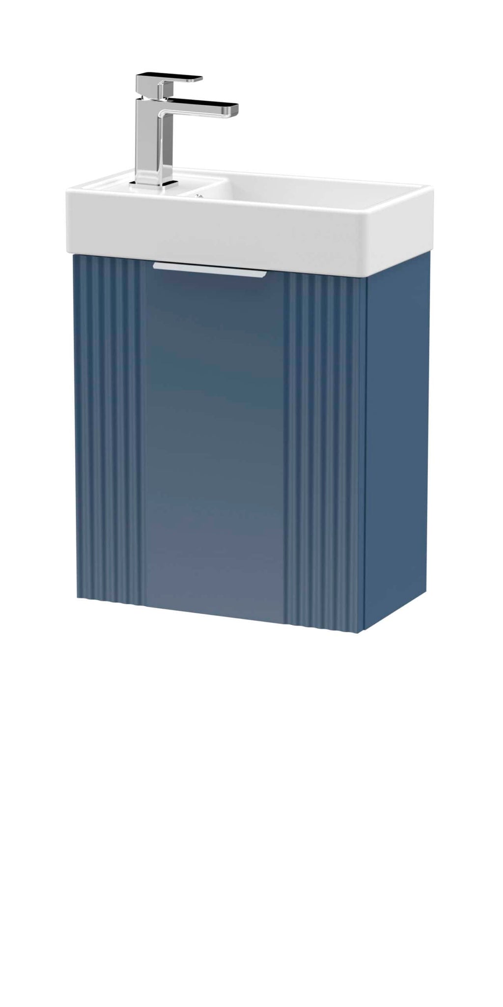 Chrome bathroom vanity unit with white ceramic sink and modern chrome tap. Stylish blue cabinet with vertical grooves, ideal for contemporary bathroom storage. Perfect for compact spaces.