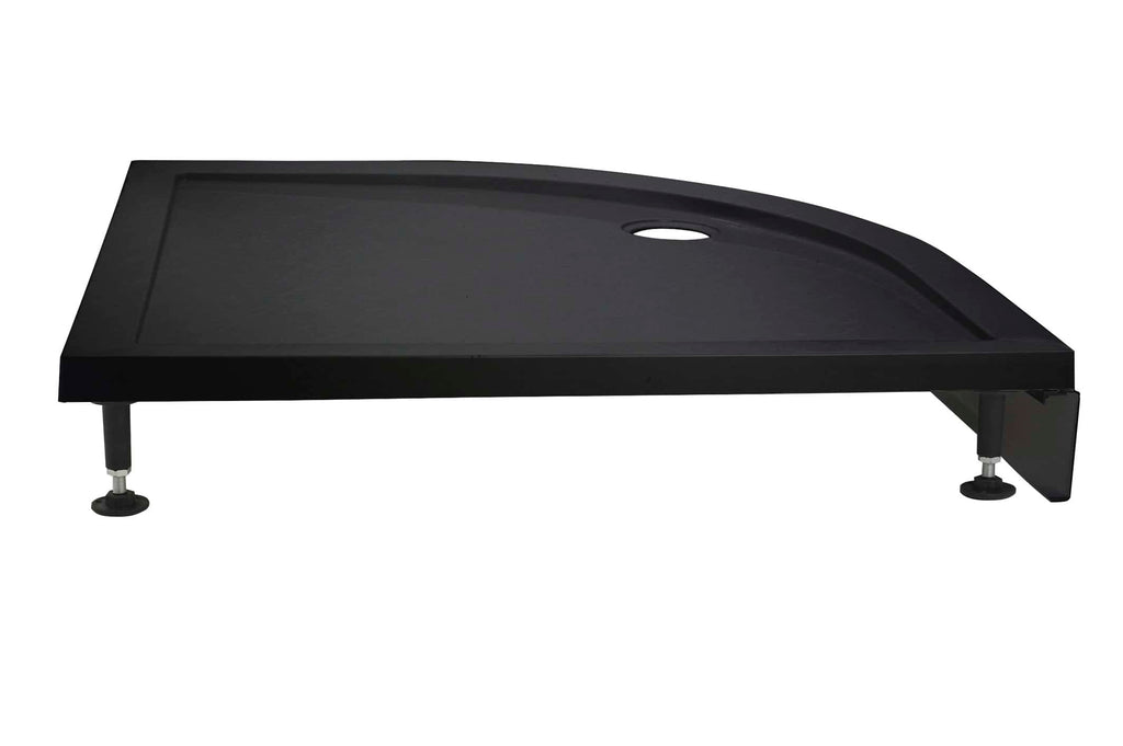 Black shower tray with adjustable feet, modern bathroom flooring solution, durable and easy to install for sleek bathroom designs.