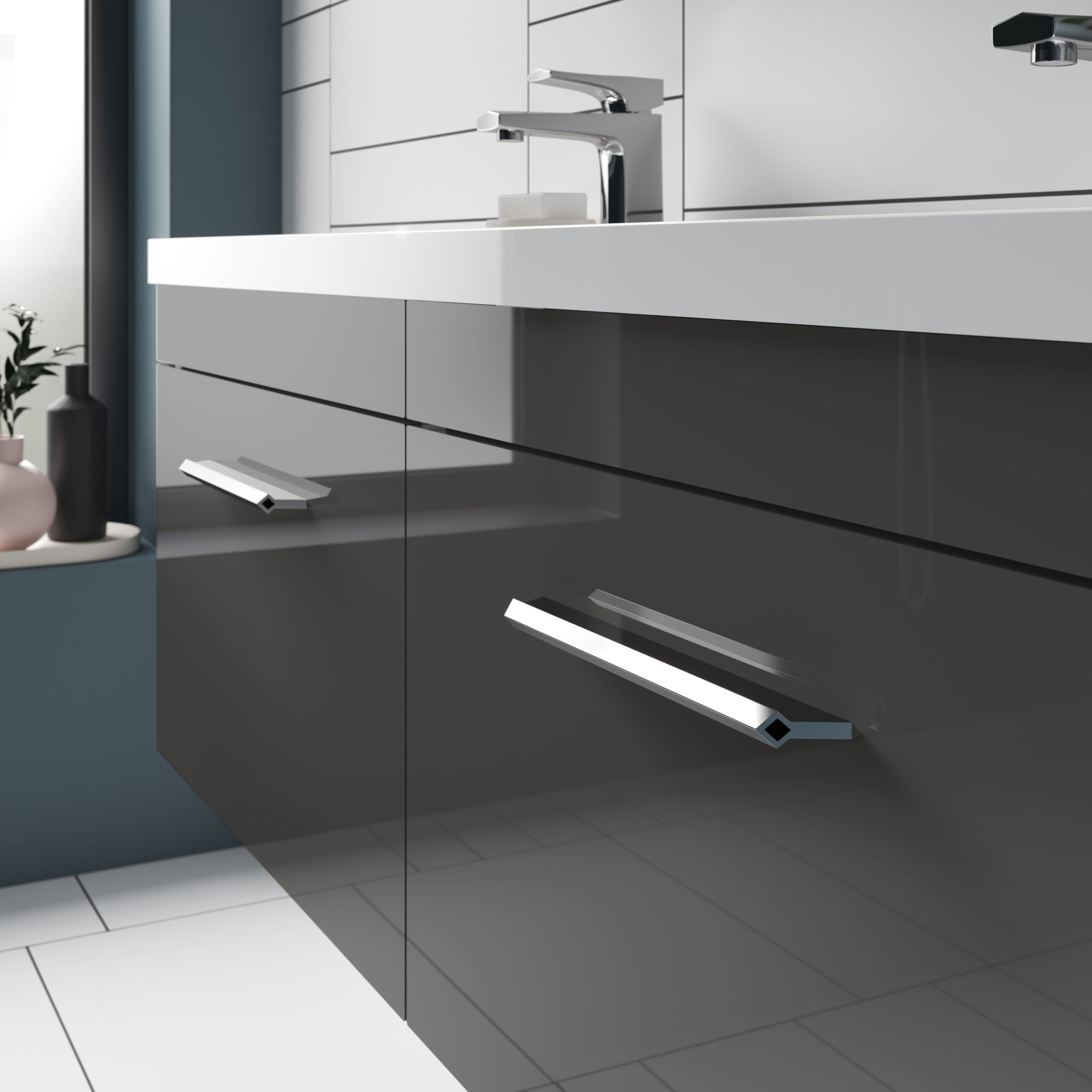 Contemporary bathroom vanity with sleek grey cabinetry and integrated modern handles, creating a stylish and functional bathroom storage solution.