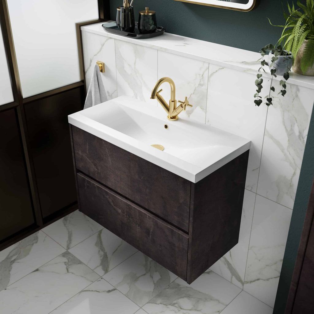 Bathroom vanity with a modern dark wood finish, white countertop, and elegant gold fixtures in a stylish contemporary bathroom setting.