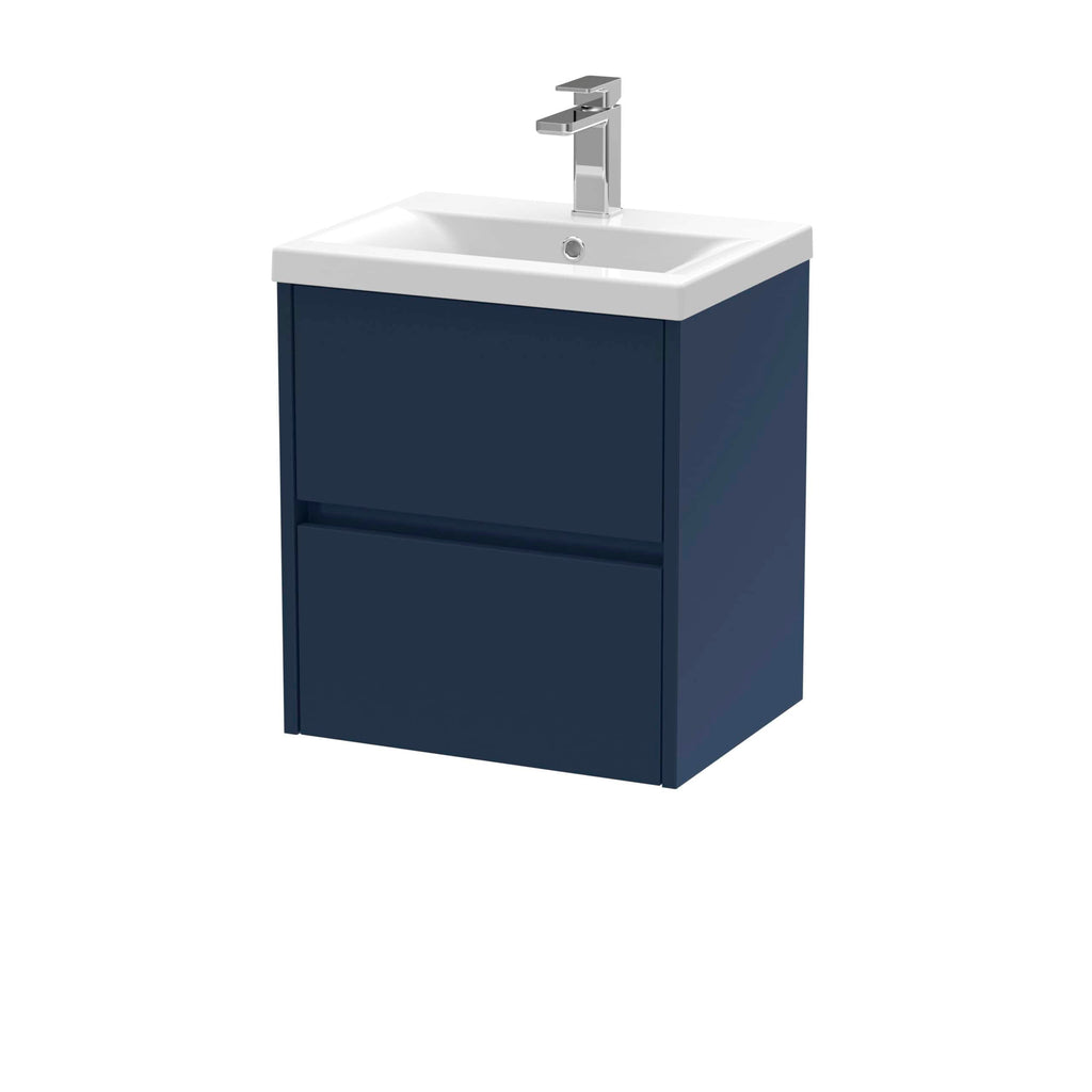 Sleek navy bathroom vanity with integrated sink and modern chrome faucet, ideal for contemporary bathroom design. Perfect for efficient use of space and stylish storage solutions.