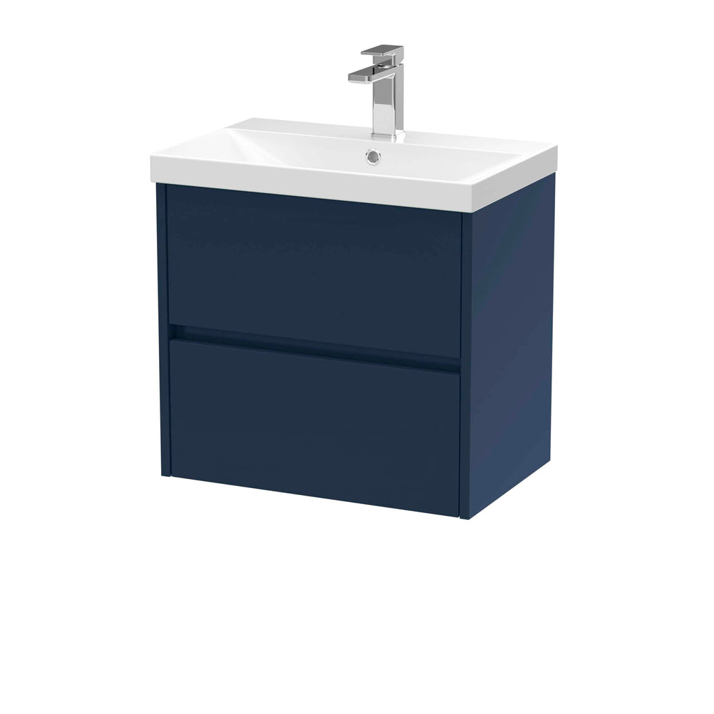 Modern navy blue bathroom vanity with integrated ceramic sink and sleek chrome-finished tap for contemporary bathroom decor.