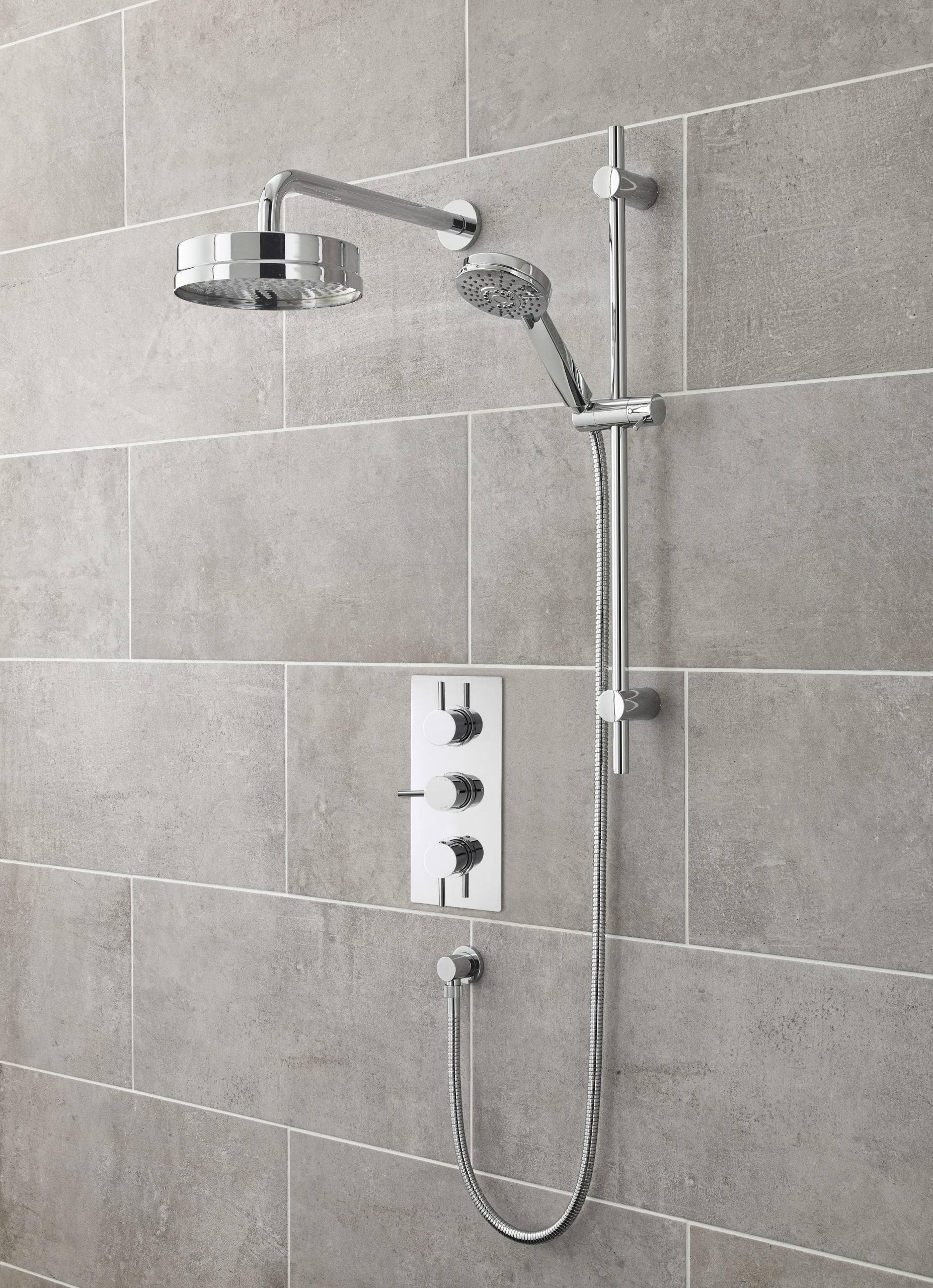 Sleek, modern chrome shower panel with adjustable handset and overhead rain shower for luxury bathroom bathing experience.