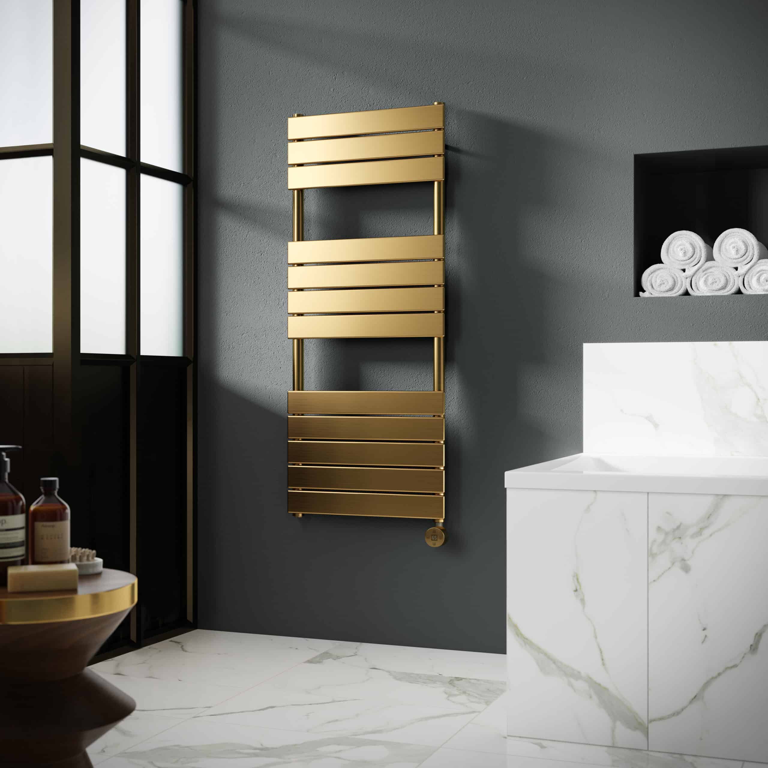 Luxurious gold towel radiator in a modern bathroom with dark grey walls and marble flooring, combining contemporary design and functional heated towel rails.