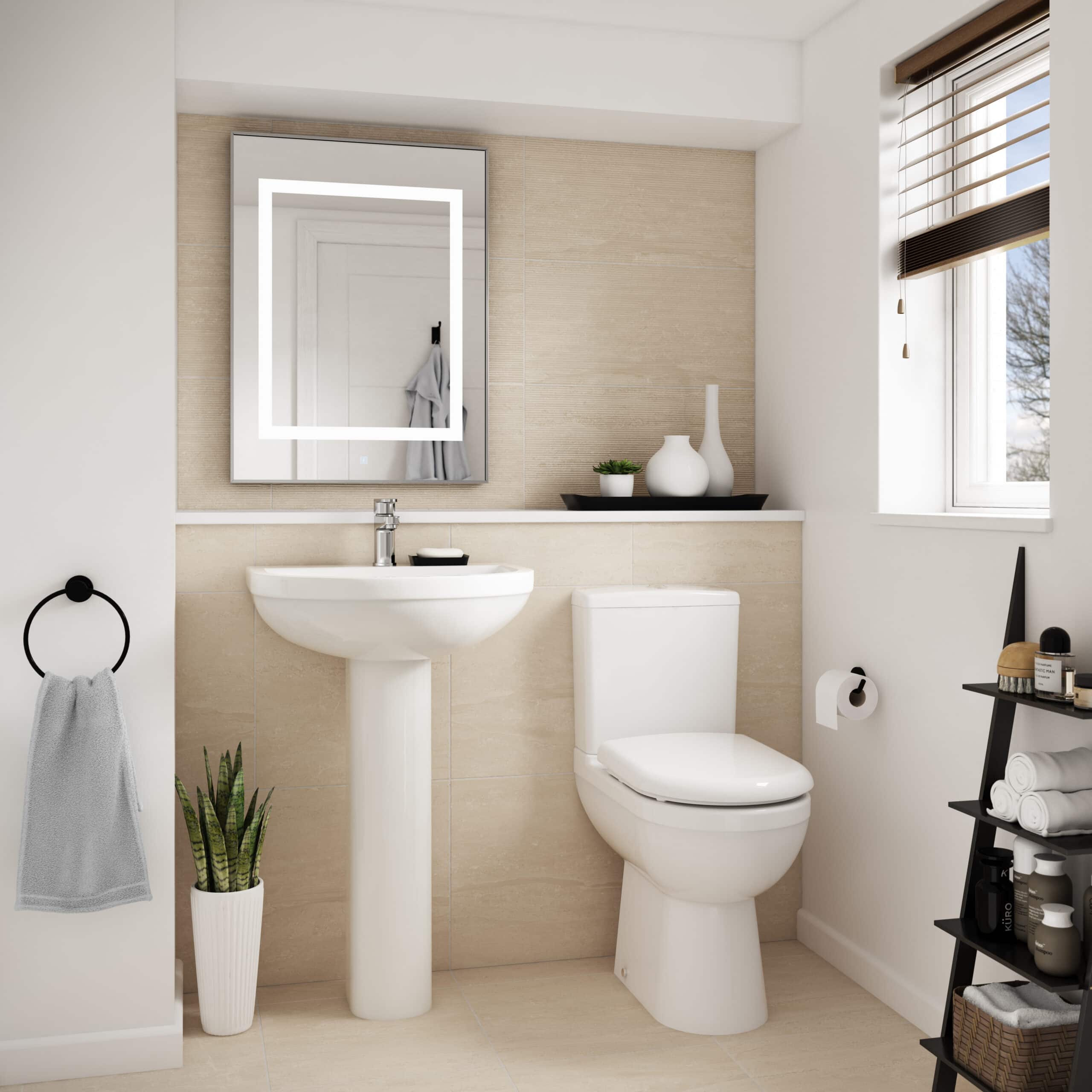 Modern minimalist bathroom featuring a white porcelain toilet and sink, beige tiled wall, decorative vases, and stylish storage with towels and toiletries. Bright natural light from a nearby window enhances the space.