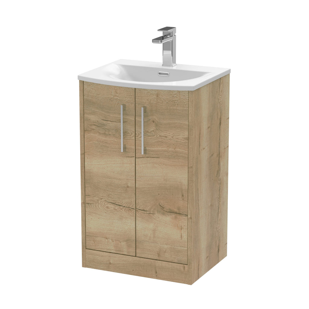 Polished wooden bathroom vanity with integrated basin and modern chrome faucet, ideal for contemporary bathroom interiors.