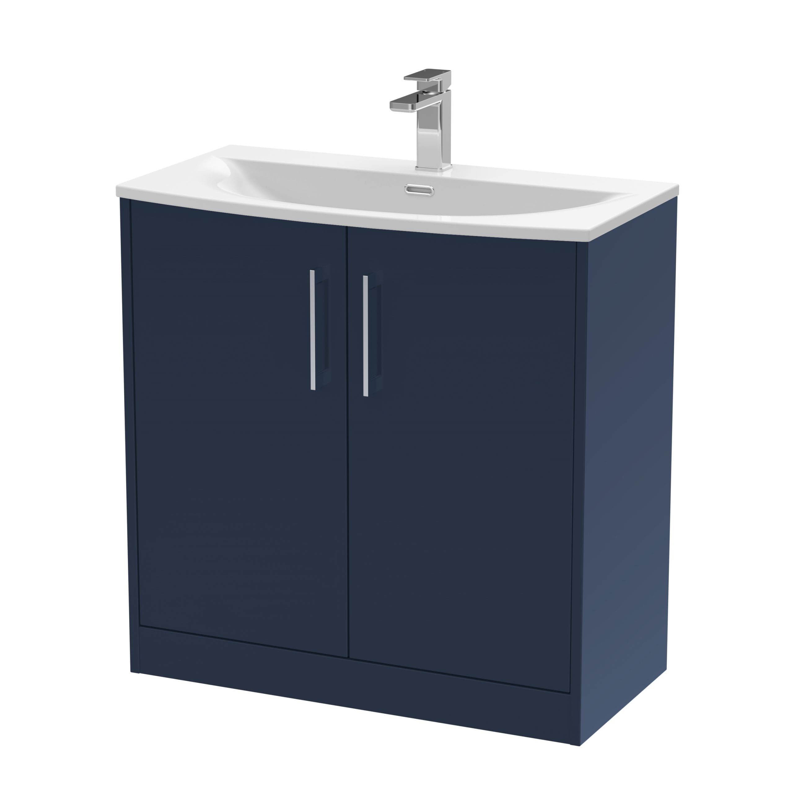Modern navy blue bathroom vanity with a white ceramic sink and chrome faucet, ideal for contemporary bathroom renovations and storage solutions.