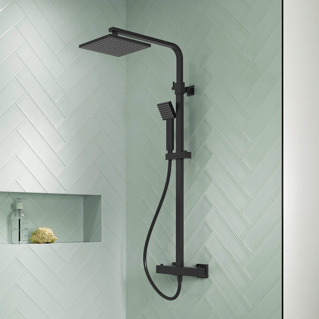 Modern black shower system with rainfall and handheld shower heads in a contemporary bathroom.