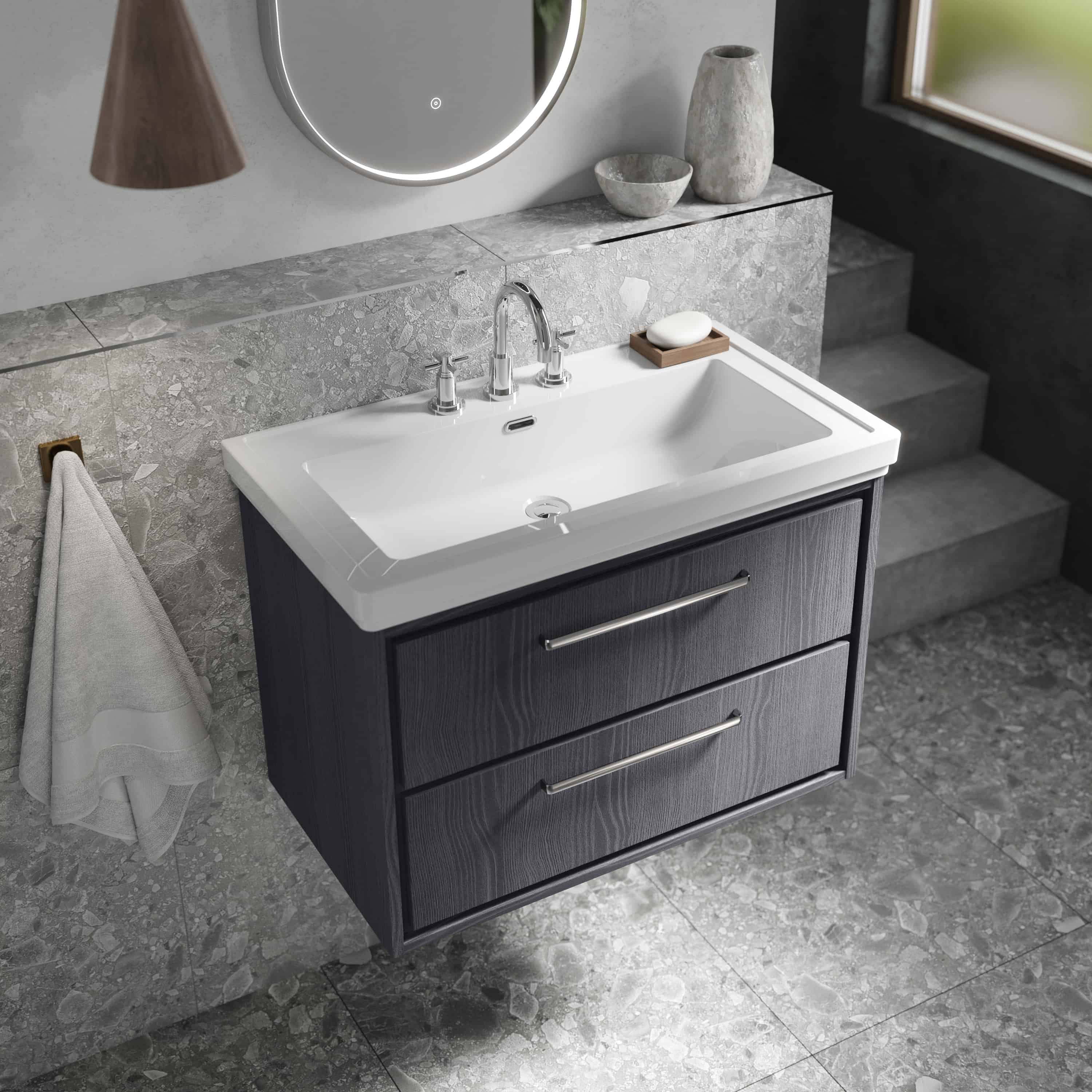 Modern bathroom vanity with a sleek white ceramic sink and dark wood cabinet, featuring double drawers with contemporary chrome handles. Perfect for stylish bathroom decor and functional storage.