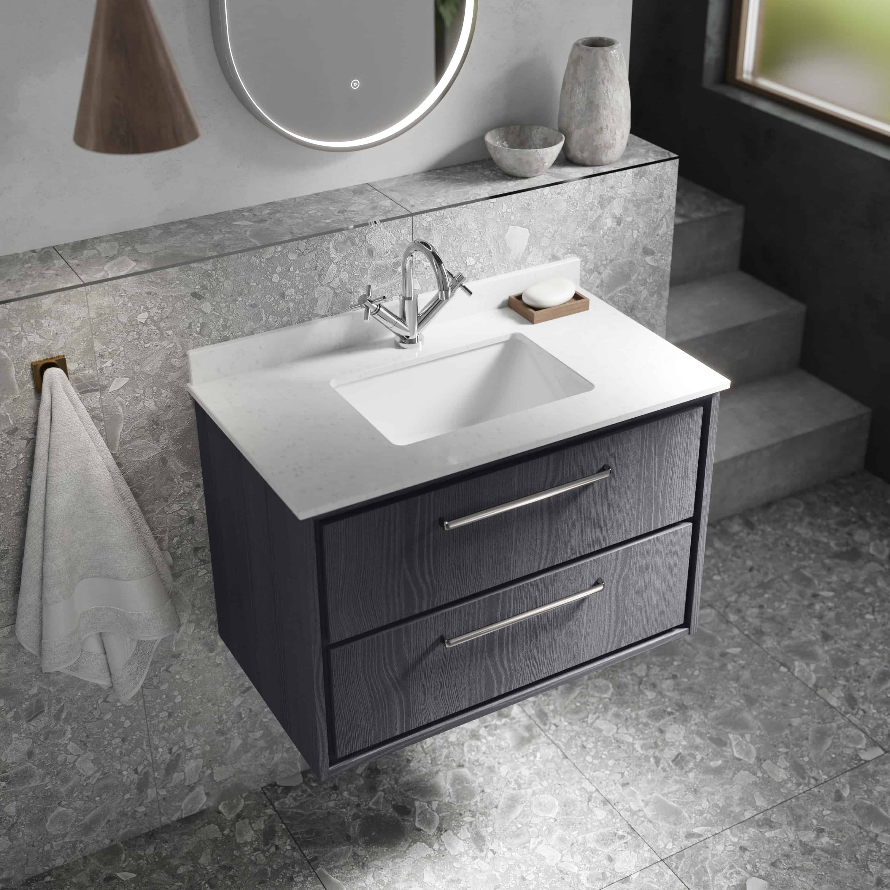 Modern bathroom vanity with marble countertop and sleek dark wood drawers, featuring a contemporary chrome faucet and minimalist decor for an elegant bathroom upgrade.