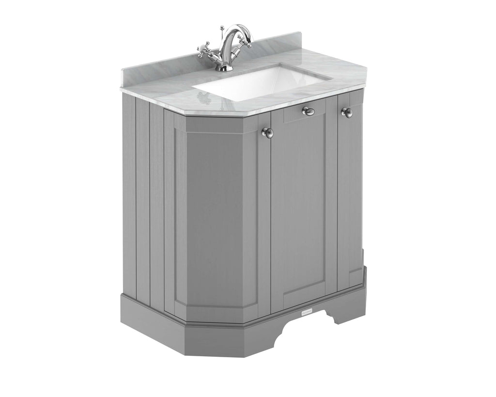 Chrome bathroom vanity unit with marble top and modern sink for elegant bathroom design.