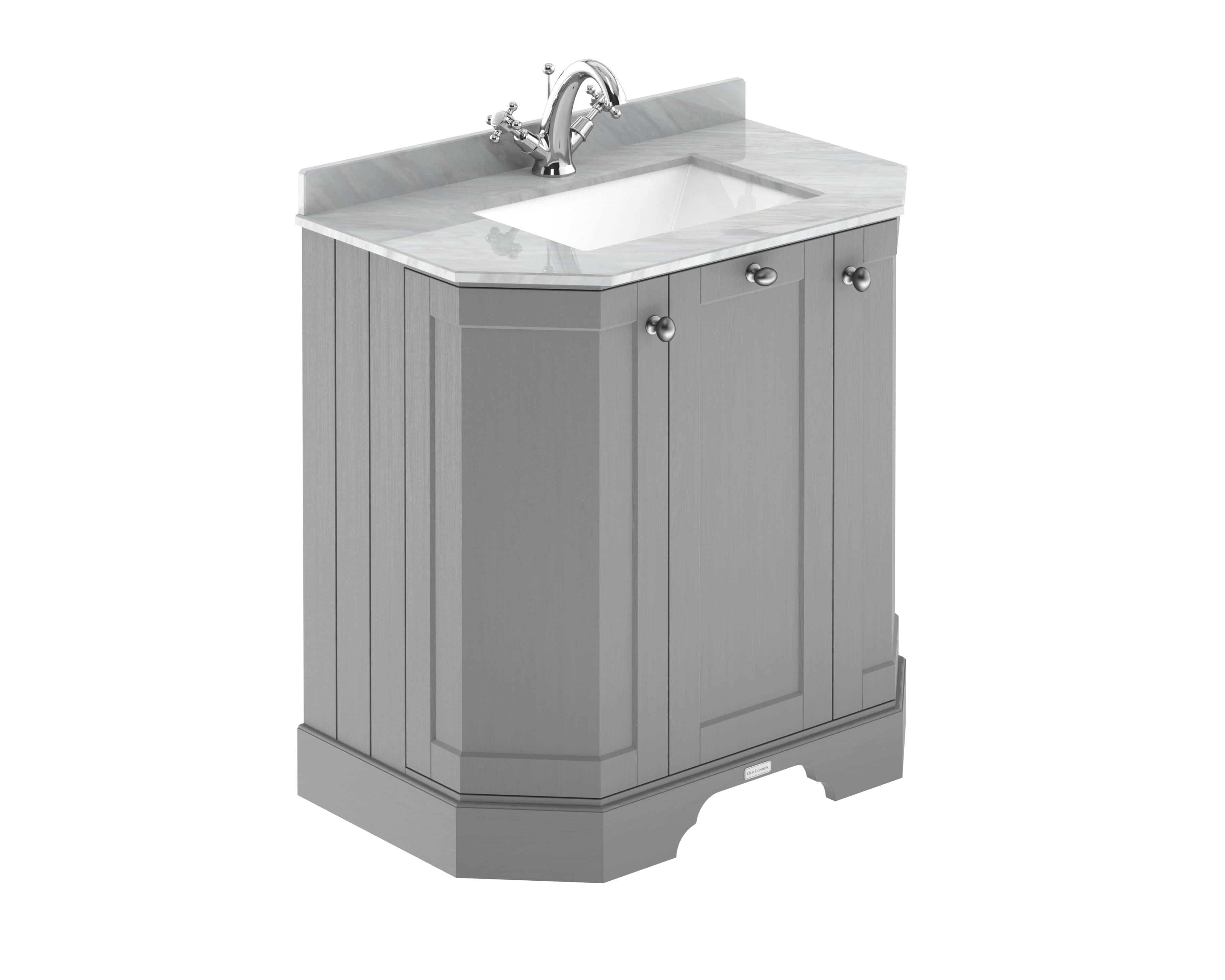 Chrome bathroom vanity unit with marble top and modern sink for elegant bathroom design.