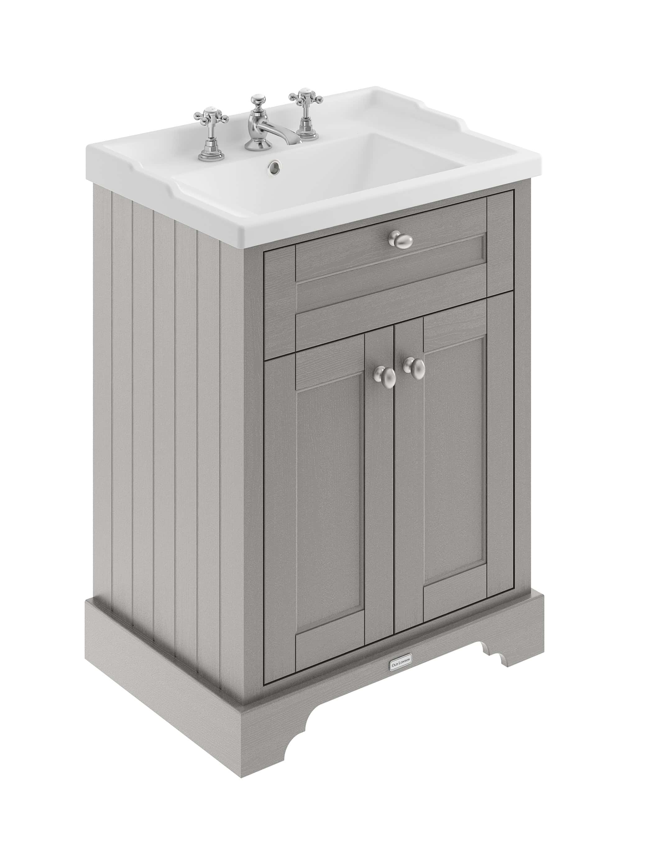 Polished freestanding bathroom vanity with a traditional sink, chrome taps, and a grey wooden cabinet in a classic bathroom setting.