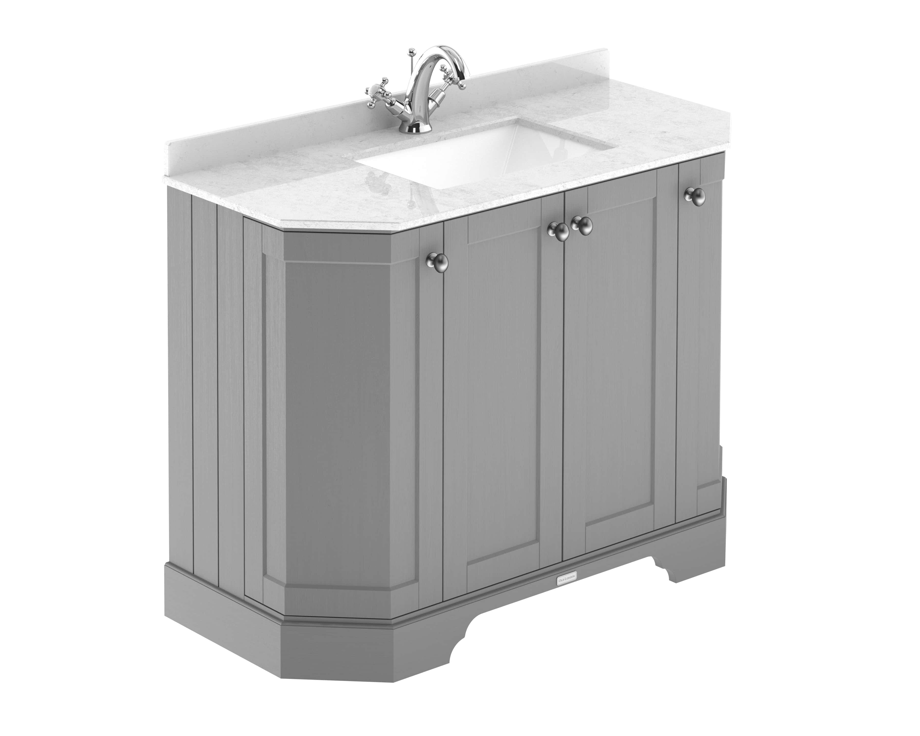 Polished bathroom vanity unit with marble countertop and undermount sink.