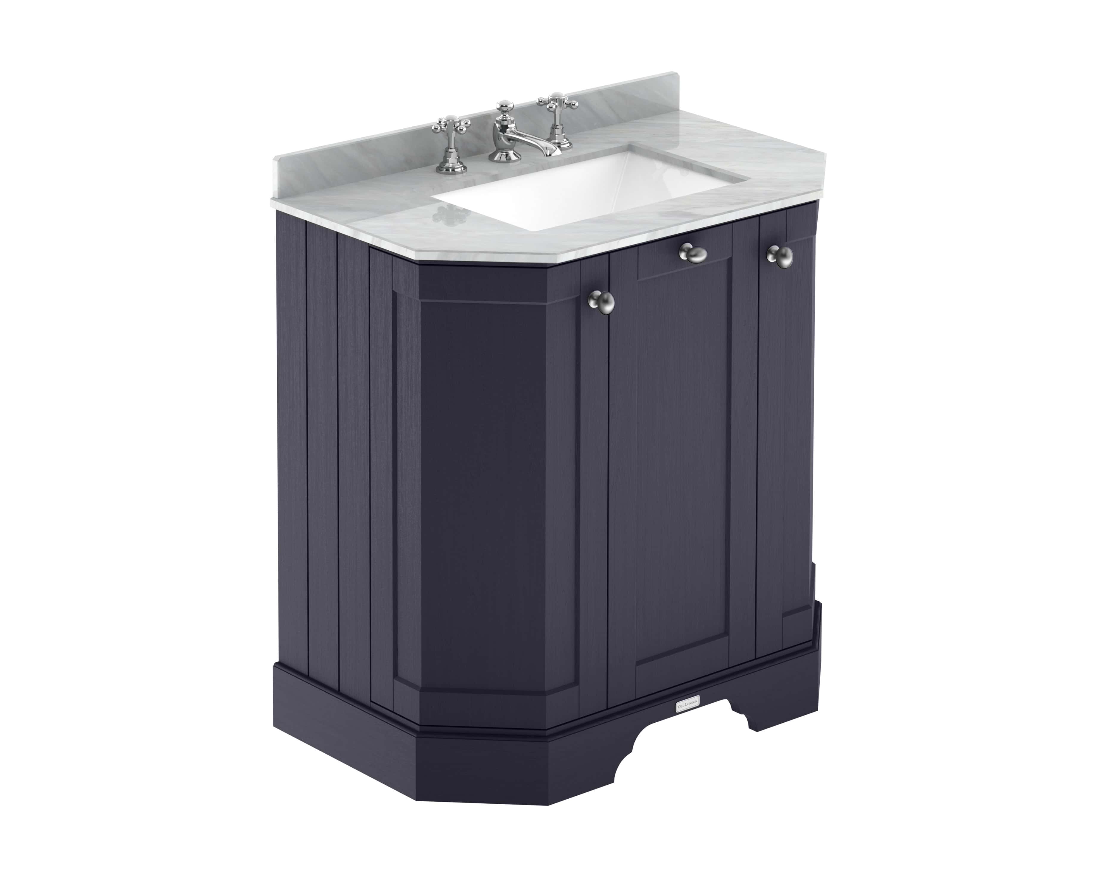 Polished navy bathroom vanity with marble countertop, chrome fixtures, and storage cabinets – ideal for modern bathroom interiors.