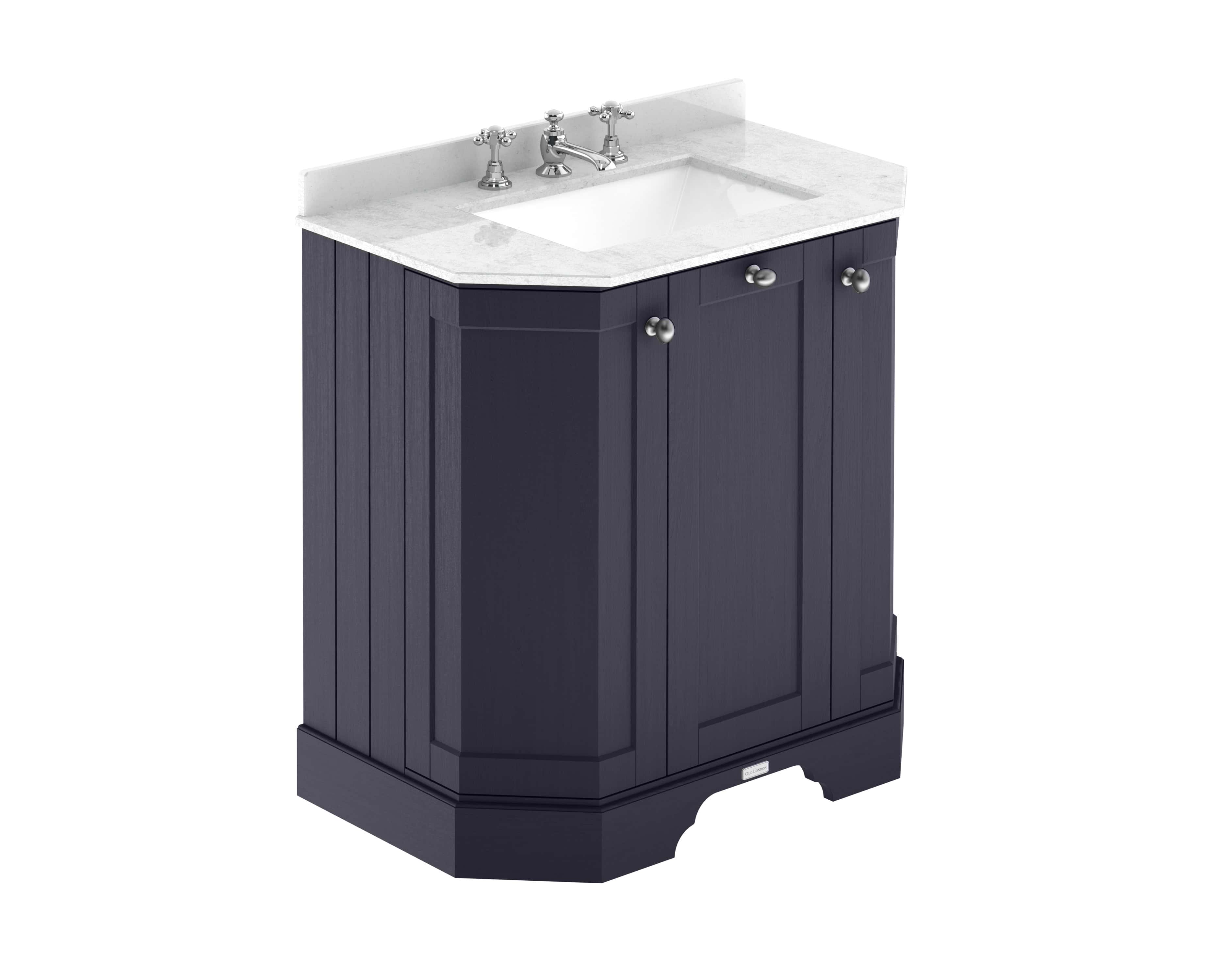 Polished traditional bathroom vanity with a classic black finish, featuring a white marble countertop, undermount sink, and vintage-style chrome faucets, perfect for elegant bathroom interior design.