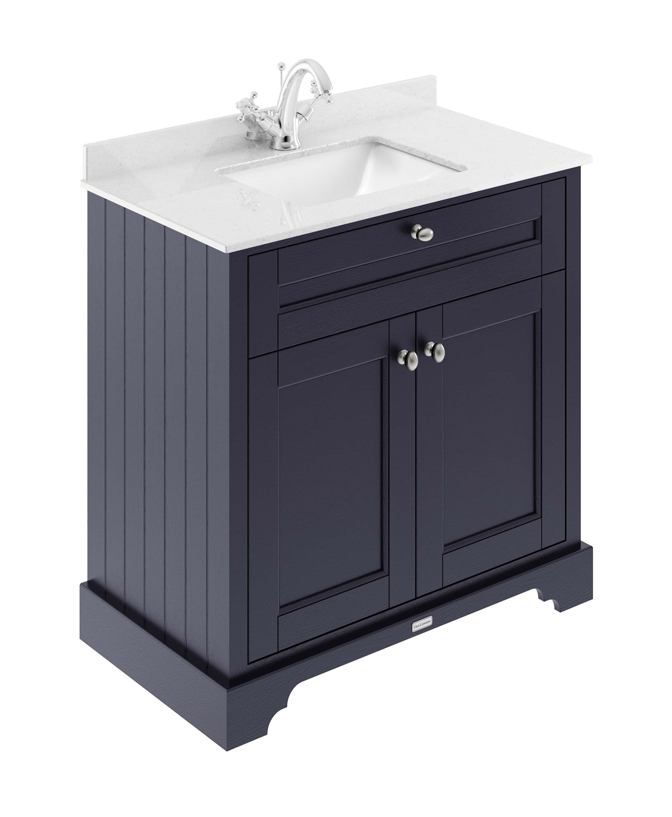 Traditional navy bathroom vanity with white quartz countertop and built-in sink, ideal for classic bathroom designs. Features silver knobs and a stylish, functional storage cabinet.