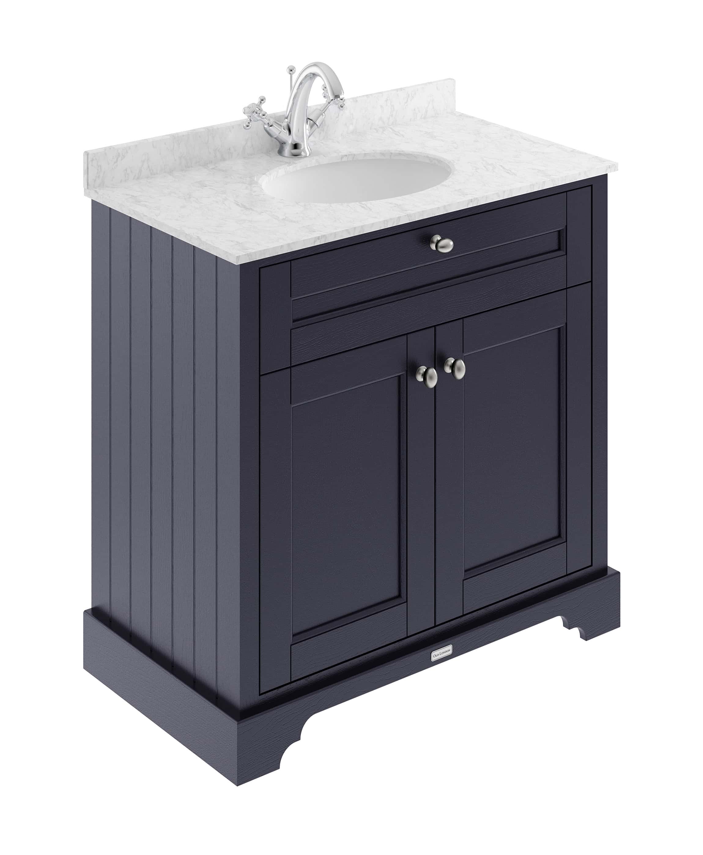 Polished navy bathroom vanity with marble countertop and chrome faucet, ideal for classic bathroom renovations. Durable wooden cabinet with storage space. Suitable for modern to traditional bathroom styles.