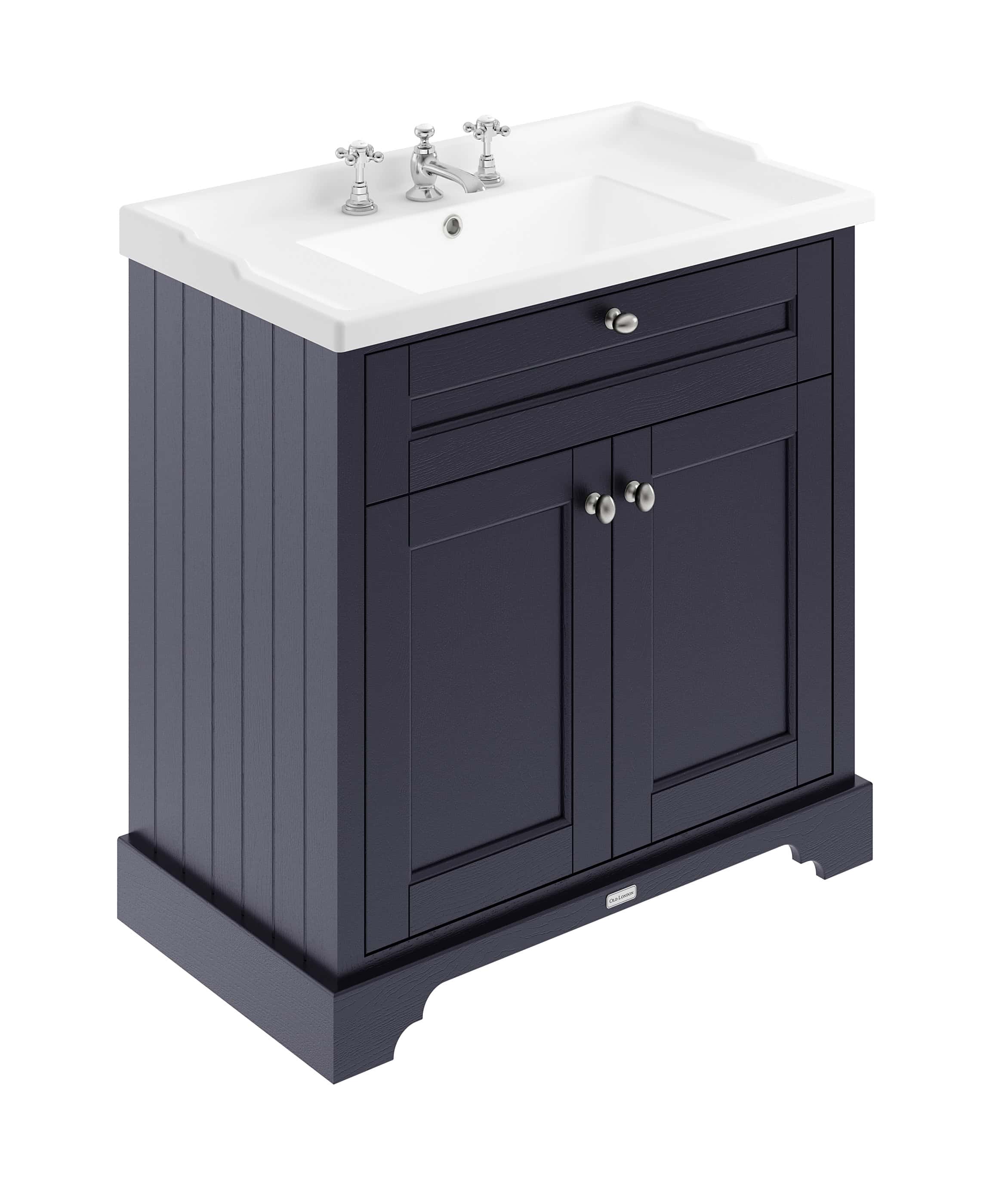 Polished blue bathroom vanity with white ceramic sink and traditional chrome taps, ideal for classic bathroom décor and storage solutions.
