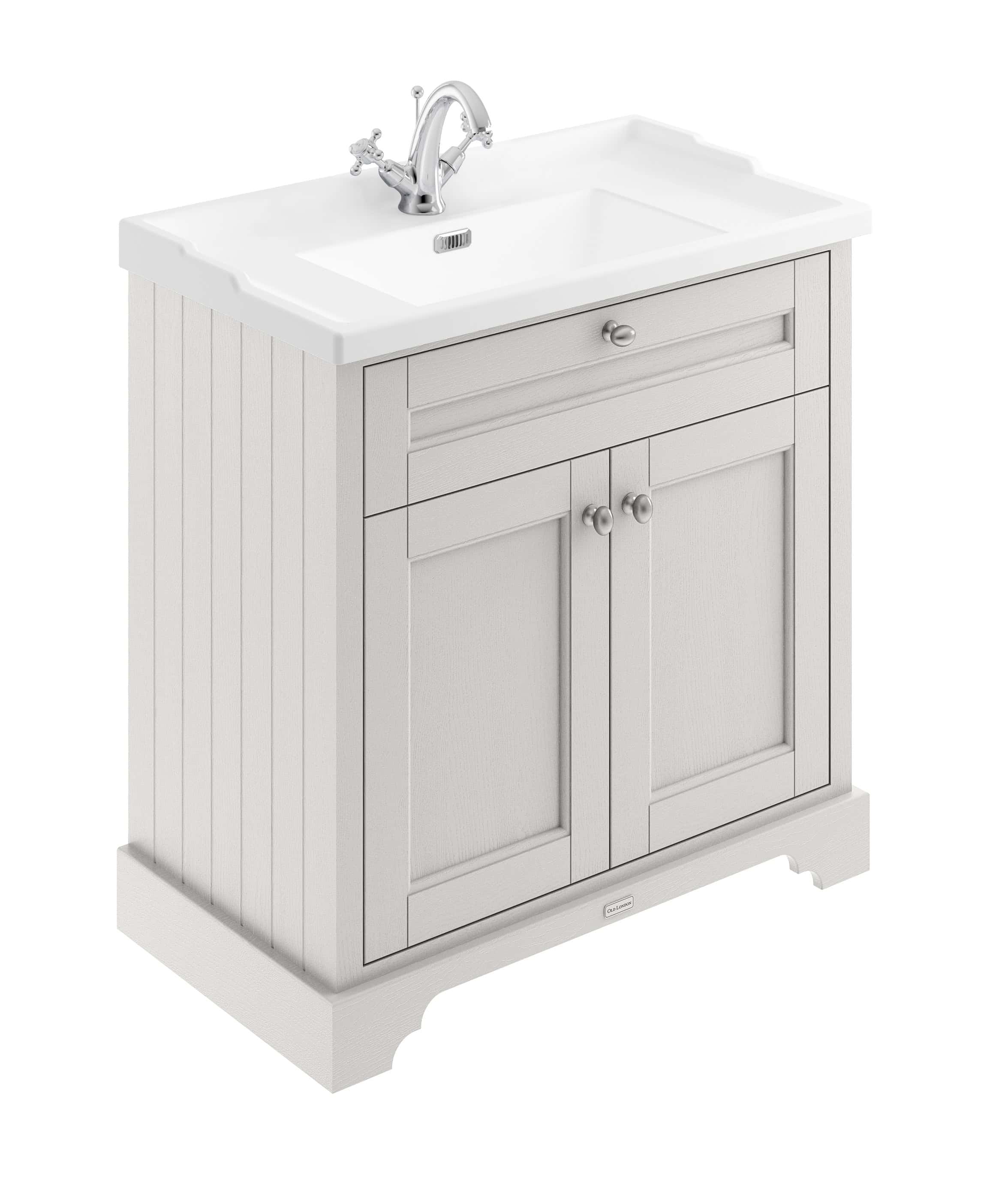 Classic white bathroom vanity with a ceramic sink and chrome fixtures, ideal for traditional or vintage bathroom decor. Durable wooden cabinet with storage space, perfect for bathroom essentials.
