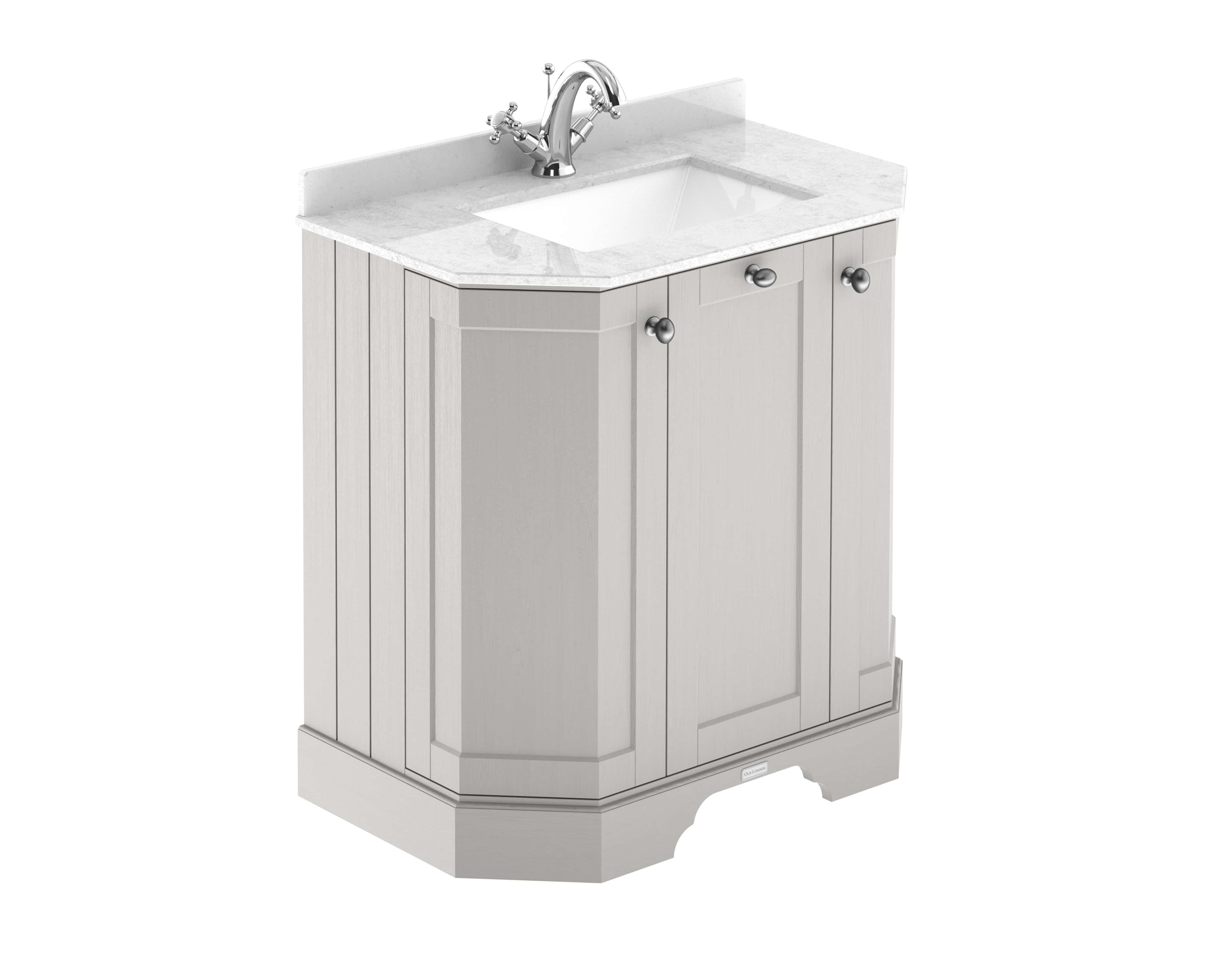 Polished white bathroom vanity unit with marble countertop and chrome tap, perfect for classic bathroom designs.
