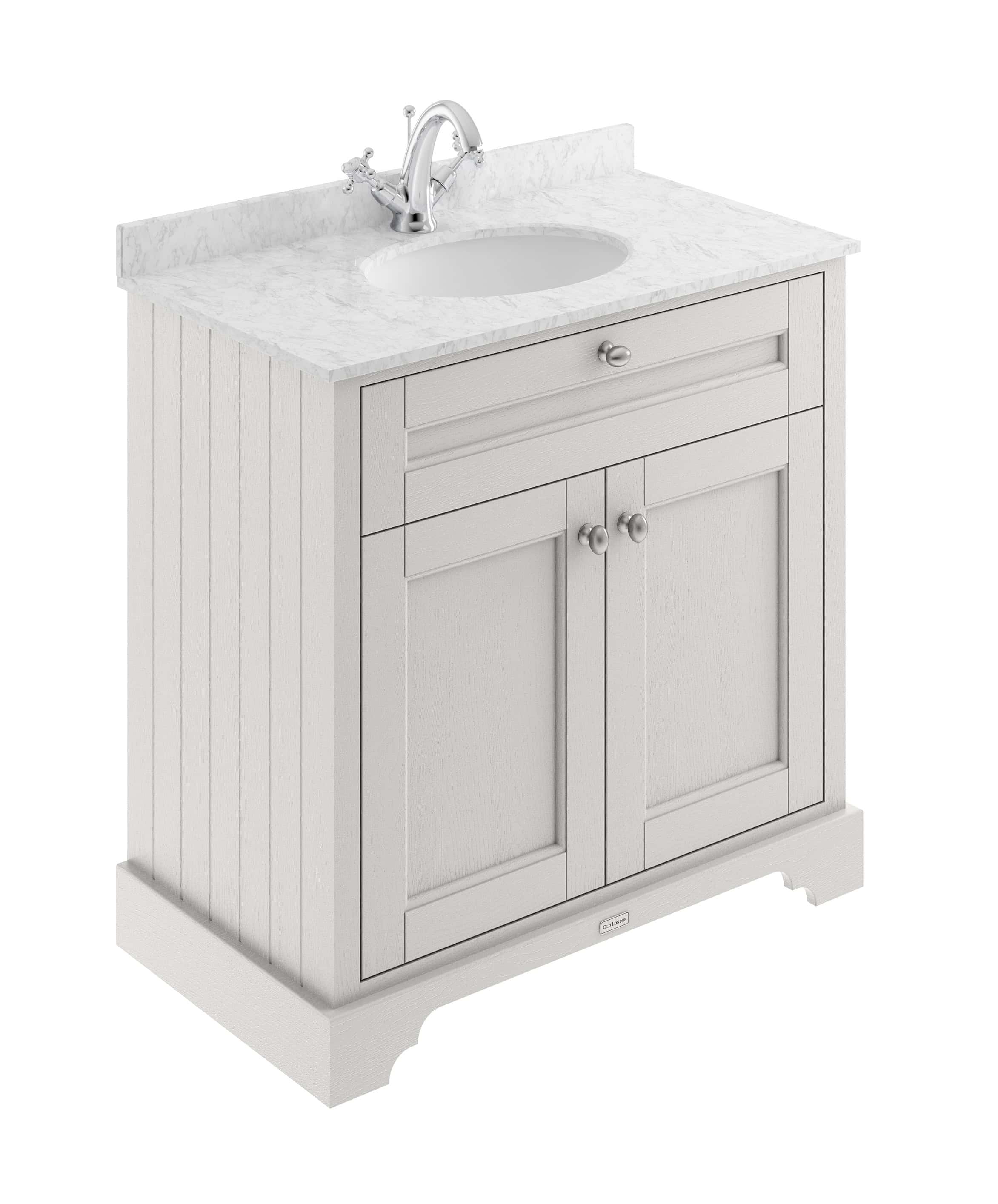 Vintage white bathroom vanity with marble top and integrated sink, featuring classic shaker style cabinetry and brushed nickel hardware. Perfect for traditional bathroom decor.