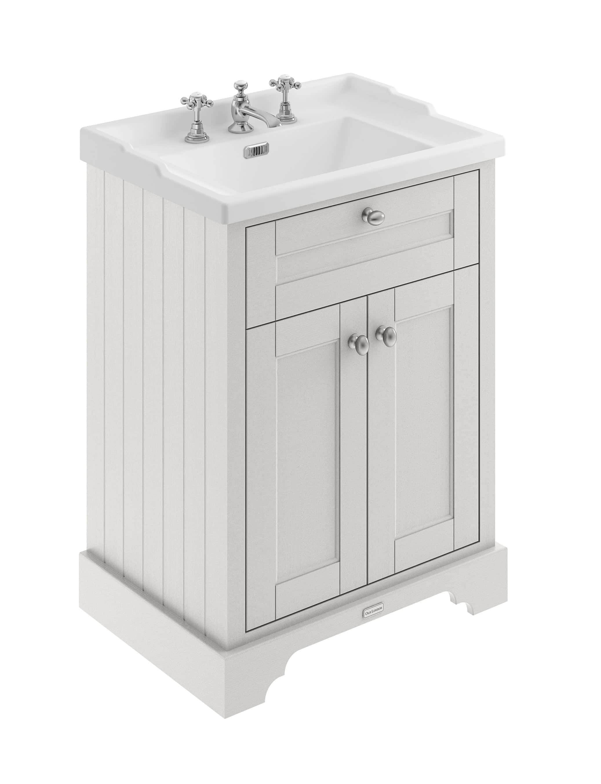 Vintage white bathroom sink with wooden cabinet, chrome taps, and classic design. Perfect for traditional and modern bathroom renovations, offering style and functionality.