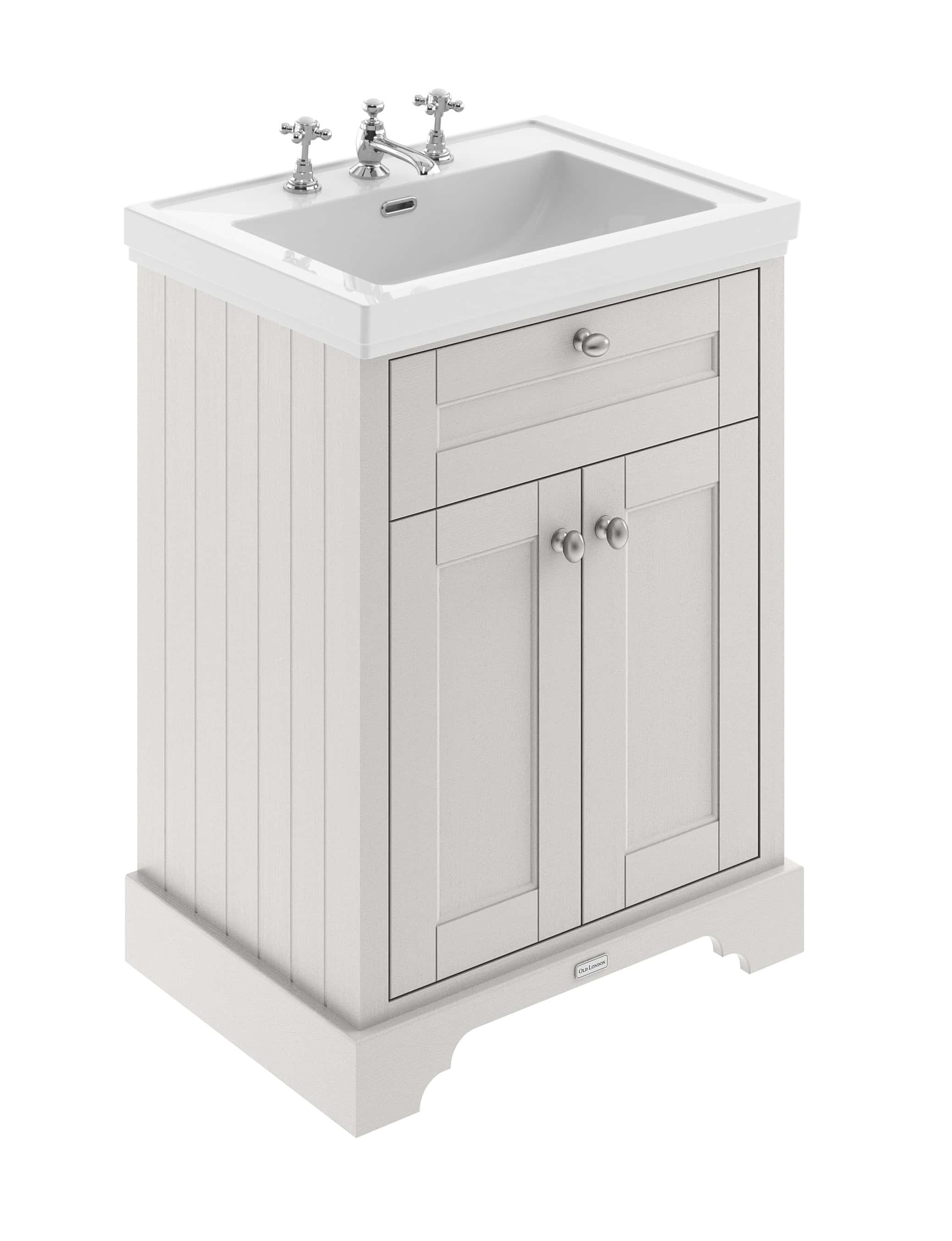 Polished white bathroom sink vanity unit with traditional style, classic chrome taps, and timber beaded cabinet doors, perfect for enhancing your bathroom décor.
